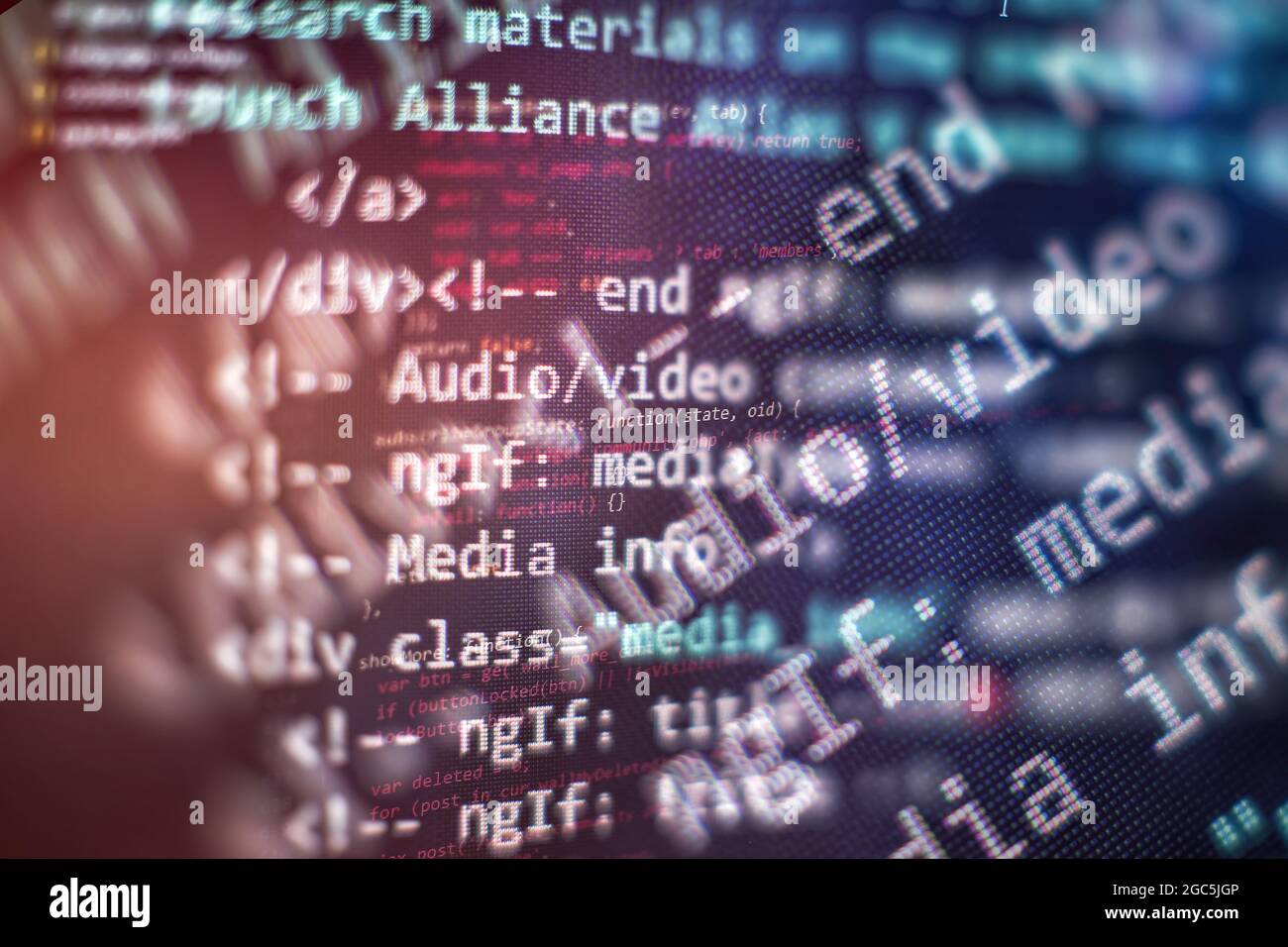 SEO optimization. Modern tech. PHP syntax highlighted. Writing programming functions on laptop. Stock Photo
