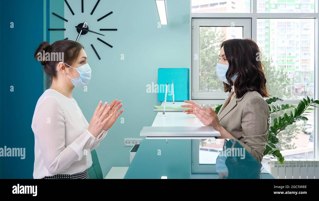 Office reception desk mask hi-res stock photography and images - Alamy