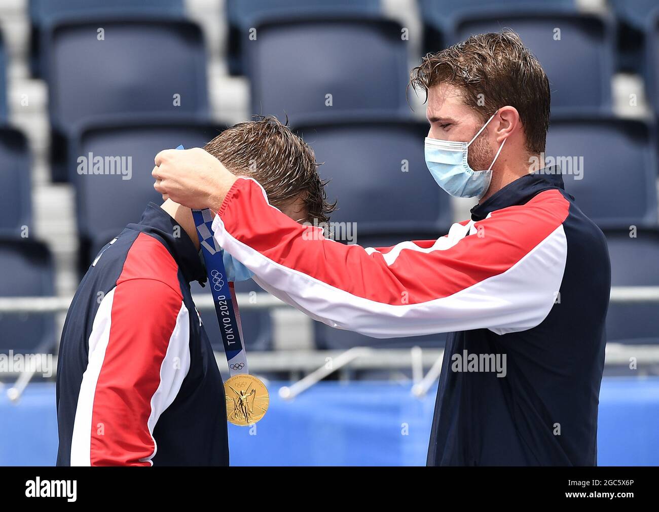 Tokyo, Japan. 7th Aug, 2021. Gold medalists Norway's Anders Berntsen Mol (R)/Christian Sandlie Sorum put on the medals during the awarding ceremony for the men's beach volleyball event at the Tokyo 2020 Olympic Games in Tokyo, Japan, Aug. 7, 2021. Credit: Li He/Xinhua/Alamy Live News Stock Photo