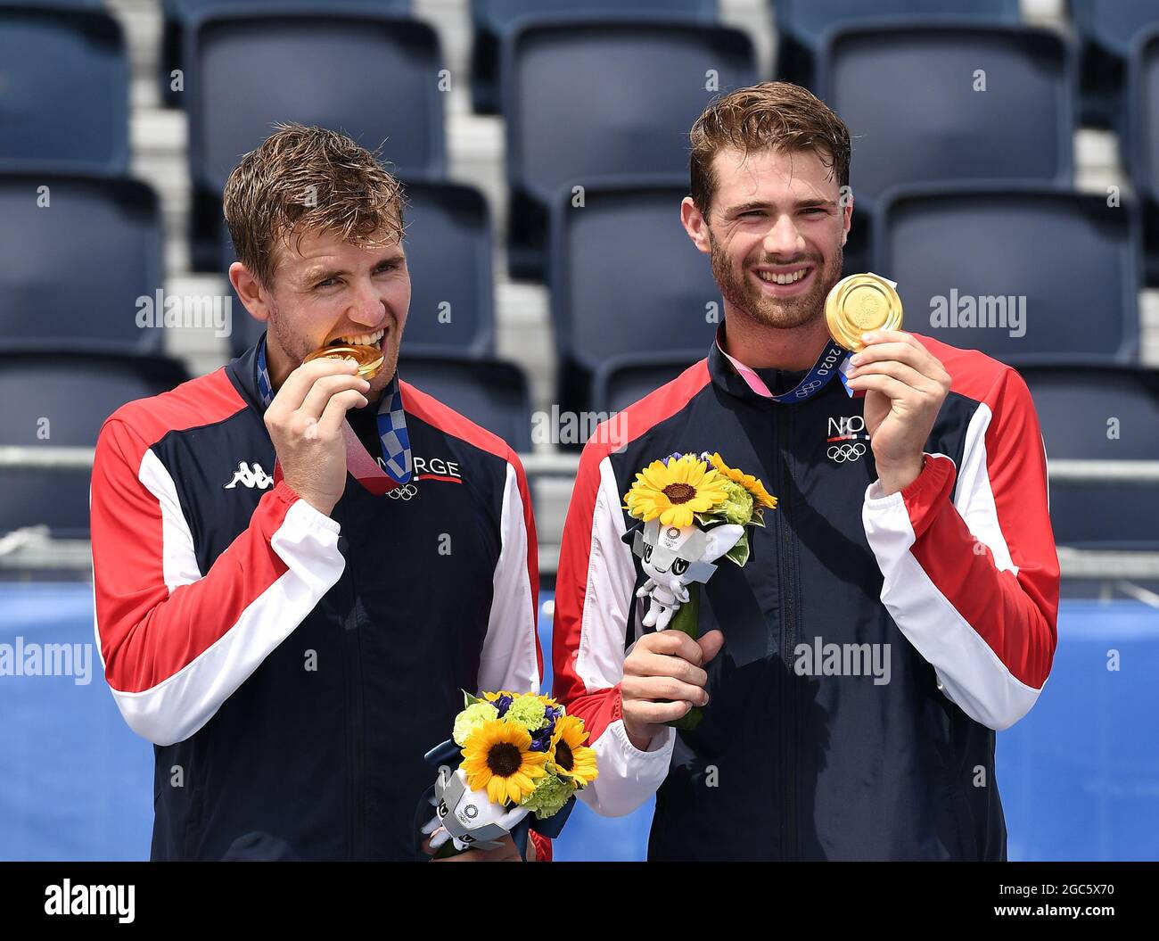 Tokyo, Japan. 7th Aug, 2021. Gold medalists Norway's Anders Berntsen Mol (R)/Christian Sandlie Sorum celebrate during the awarding ceremony for the men's beach volleyball event at the Tokyo 2020 Olympic Games in Tokyo, Japan, Aug. 7, 2021. Credit: Li He/Xinhua/Alamy Live News Stock Photo