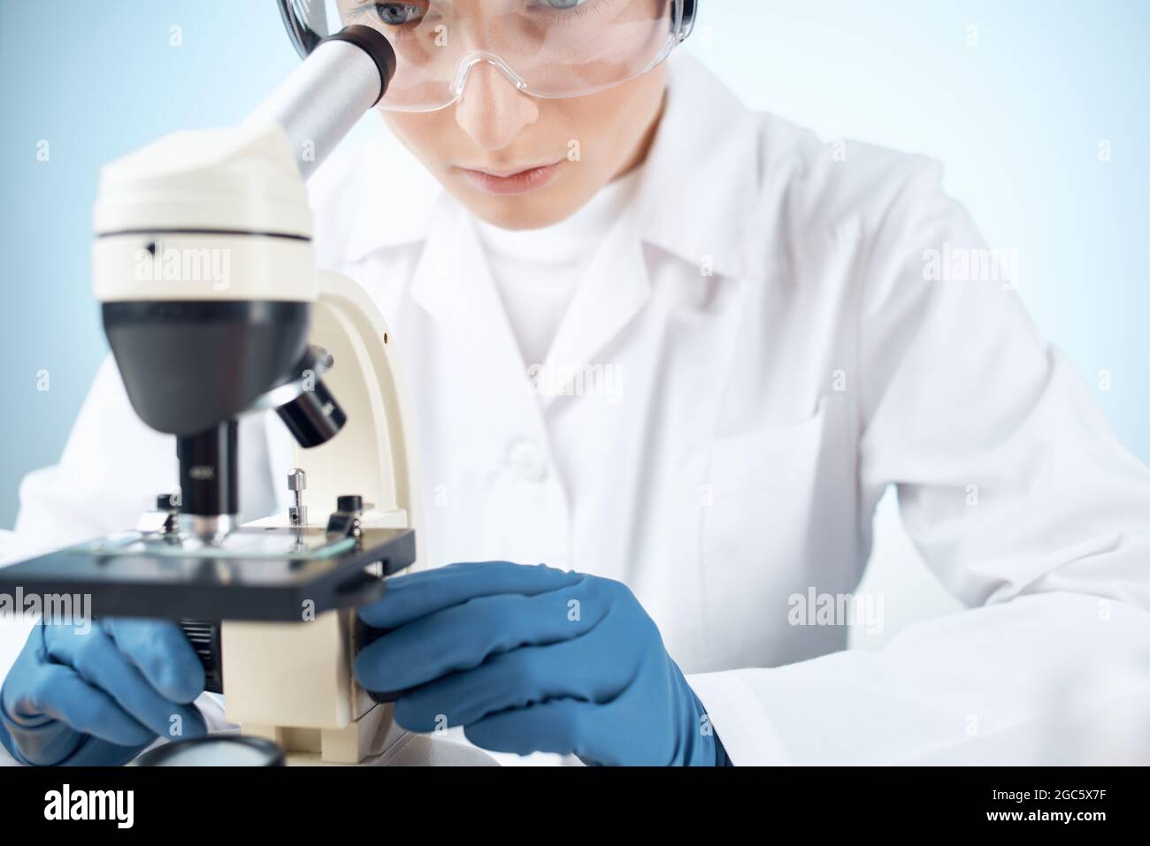 Solution Microscope laboratory research microscope chemical solution science analyzes Stock ...