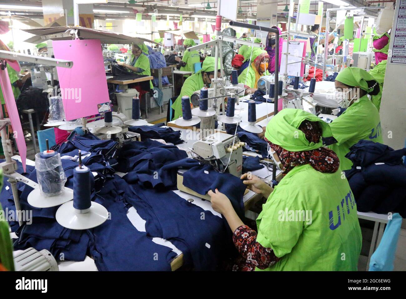 August 05,2021,Dhaka,Bangladesh Garment workers work at a factory after garment factories