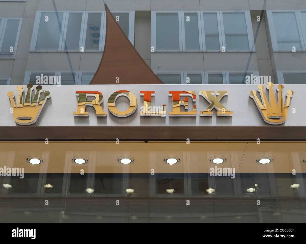 Rolex Logo in gold with crowns on a store in Hamburg in Germany Stock Photo
