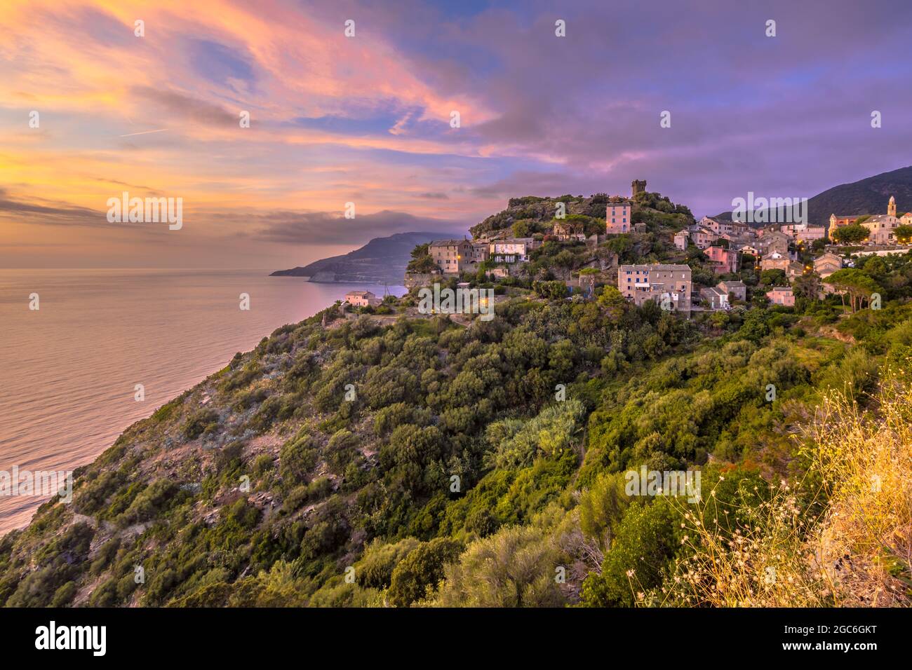 Mountain Village of Nonza with view over the mediteranean sea on Cap corse, Corsica, France Stock Photo