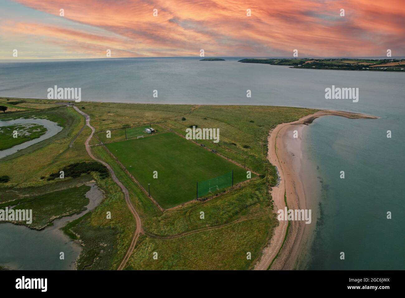 Aerial view of Pilmore Strand and the St Itas GAA pitch near Youghal in