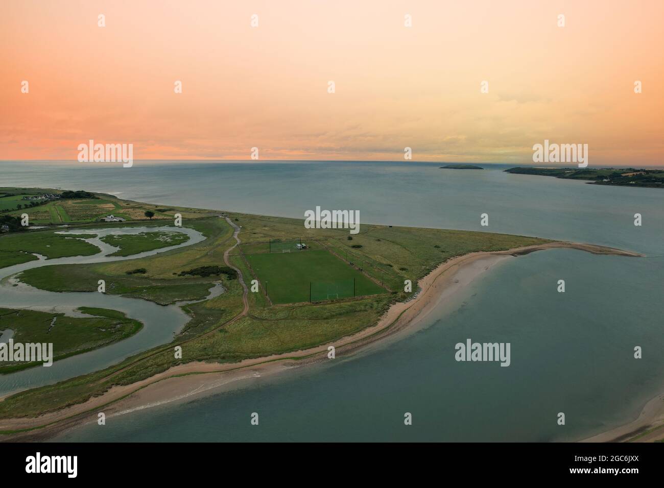 Aerial view of Pilmore Strand and the St Itas GAA pitch near Youghal in