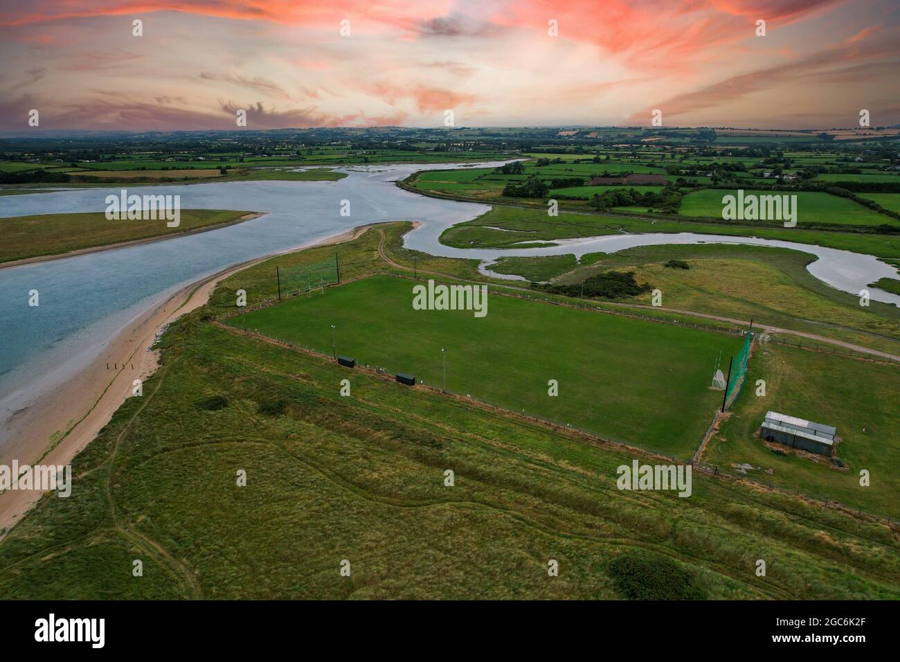 Aerial view of Pilmore Strand and the St Itas GAA pitch near Youghal in
