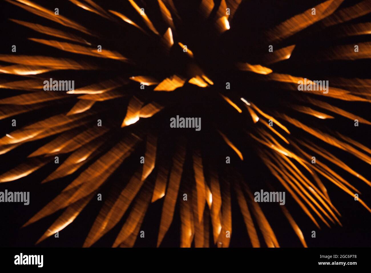 Exploding firework producing a beautiful cascading colourful display Stock Photo