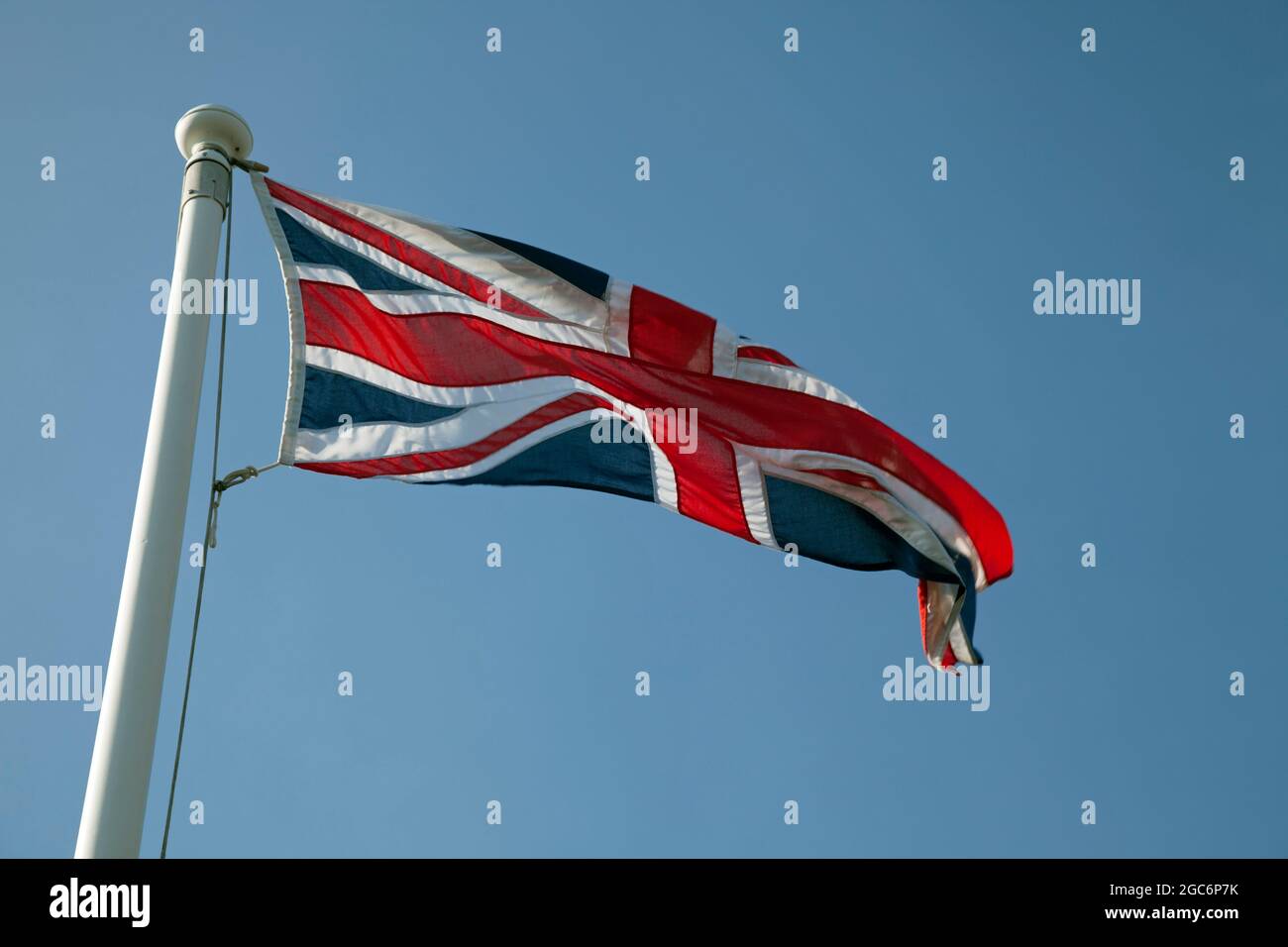 Union Jack, or Union Flag, of the United Kingdom of Great Britain flying in the breeze Stock Photo