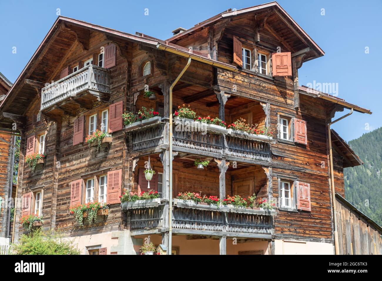traditional wooden apartment building in the swiss alps Stock Photo Alamy