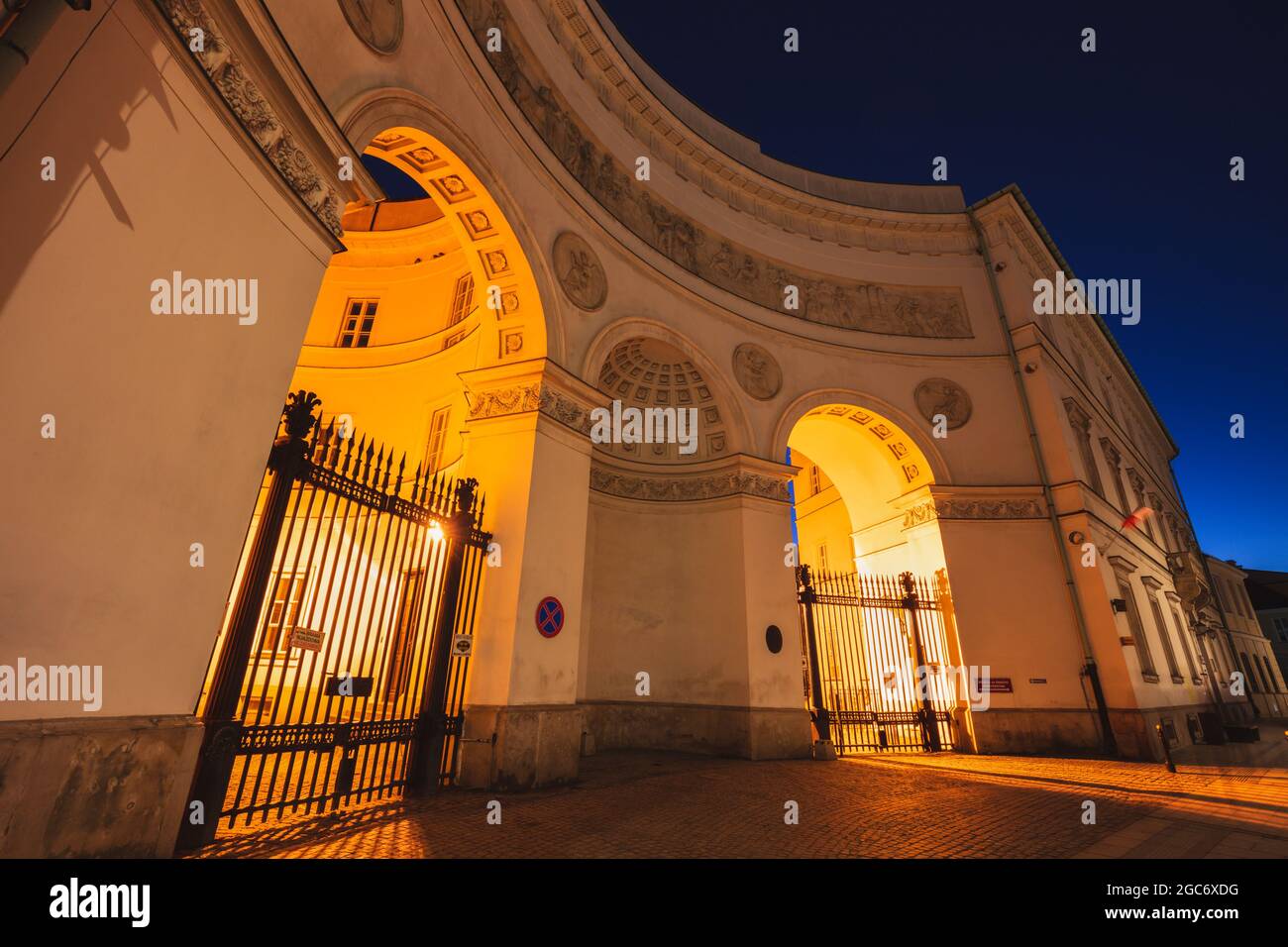 Poland, Masovia, Warsaw, Illuminated historical buildings at night Stock Photo