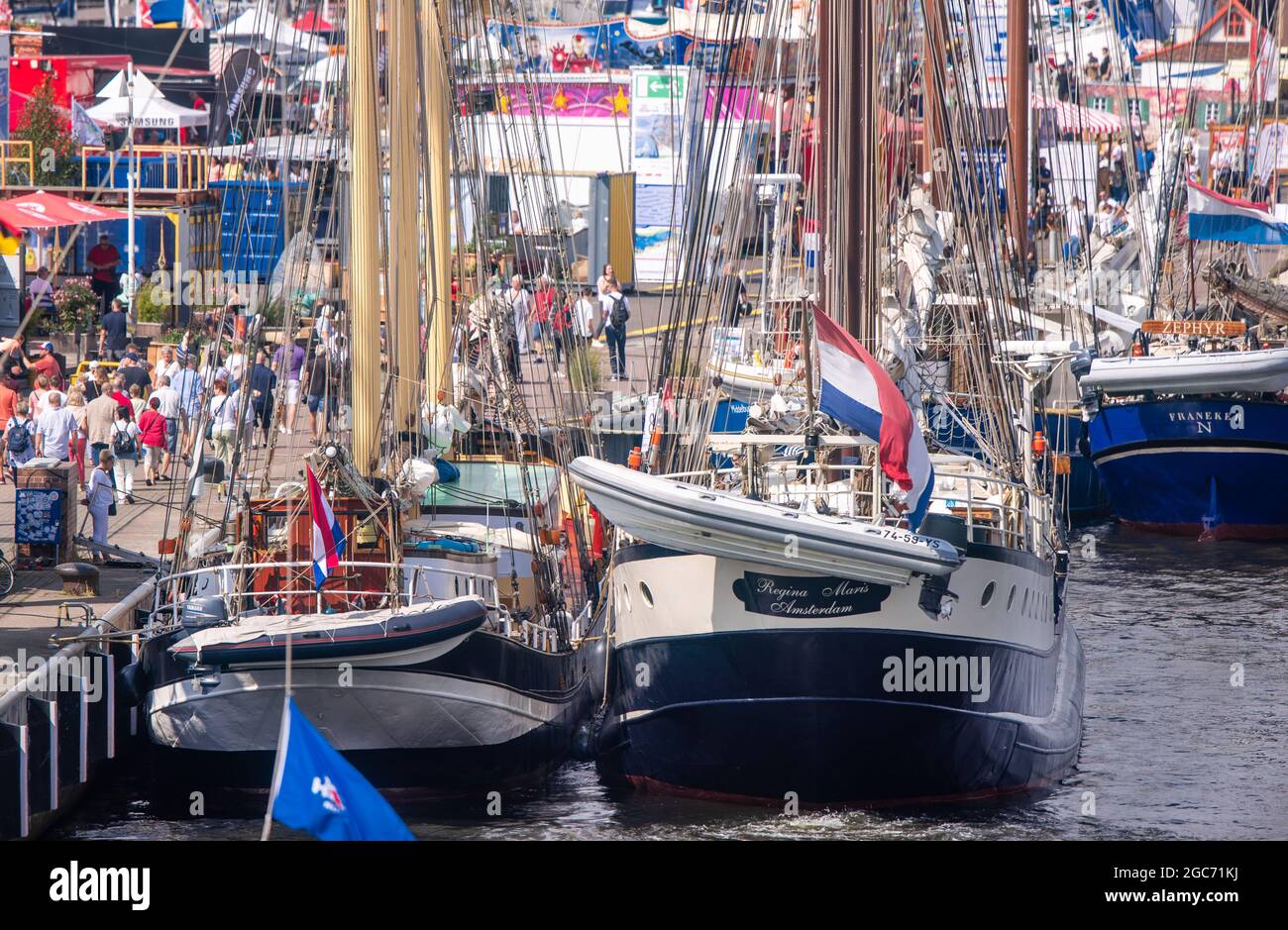 Rostock, Germany. 07th Aug, 2021. Traditional sailing ships and sailboats  are moored at the festival area of the Hanse Sail in the city harbour.  Under the motto 