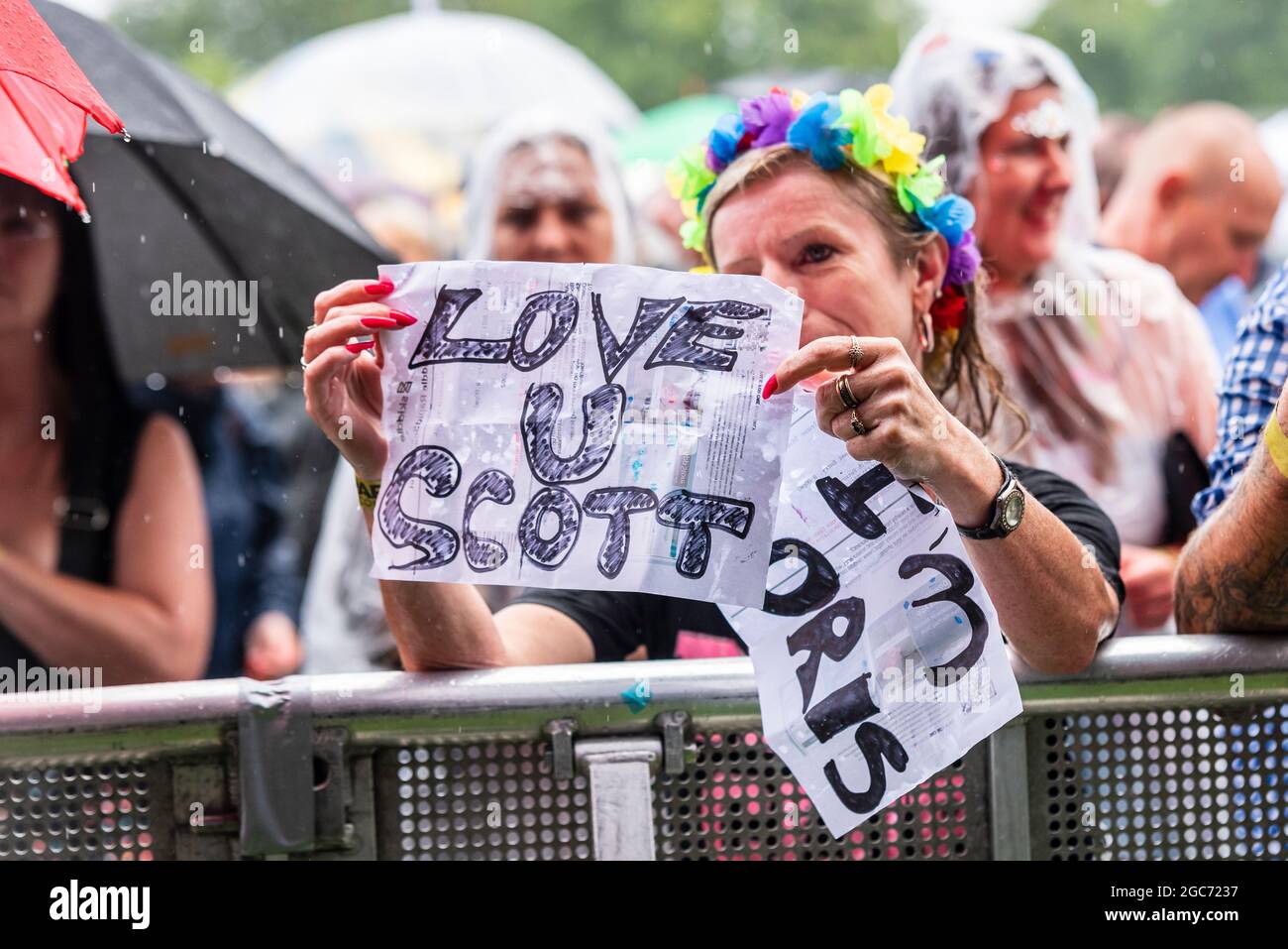 Female fan in the crowd at Fantasia music festival showing her love for Scott Robinson of the band Five, or 5ive, as they play on stage. I'm Doris Stock Photo