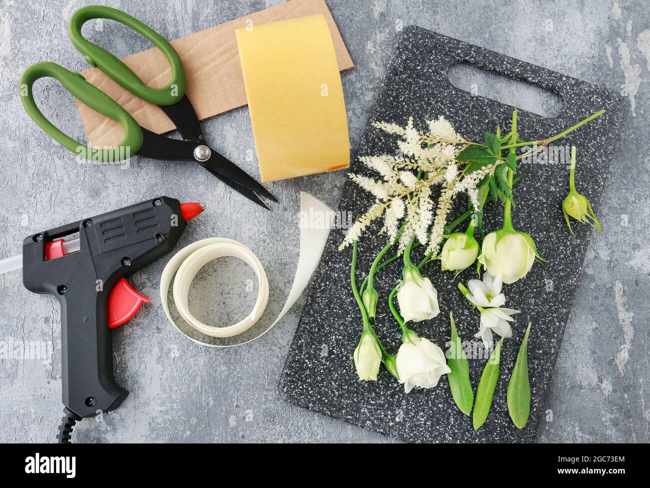 Florist at work How to make wrist corsage for bride using rose and