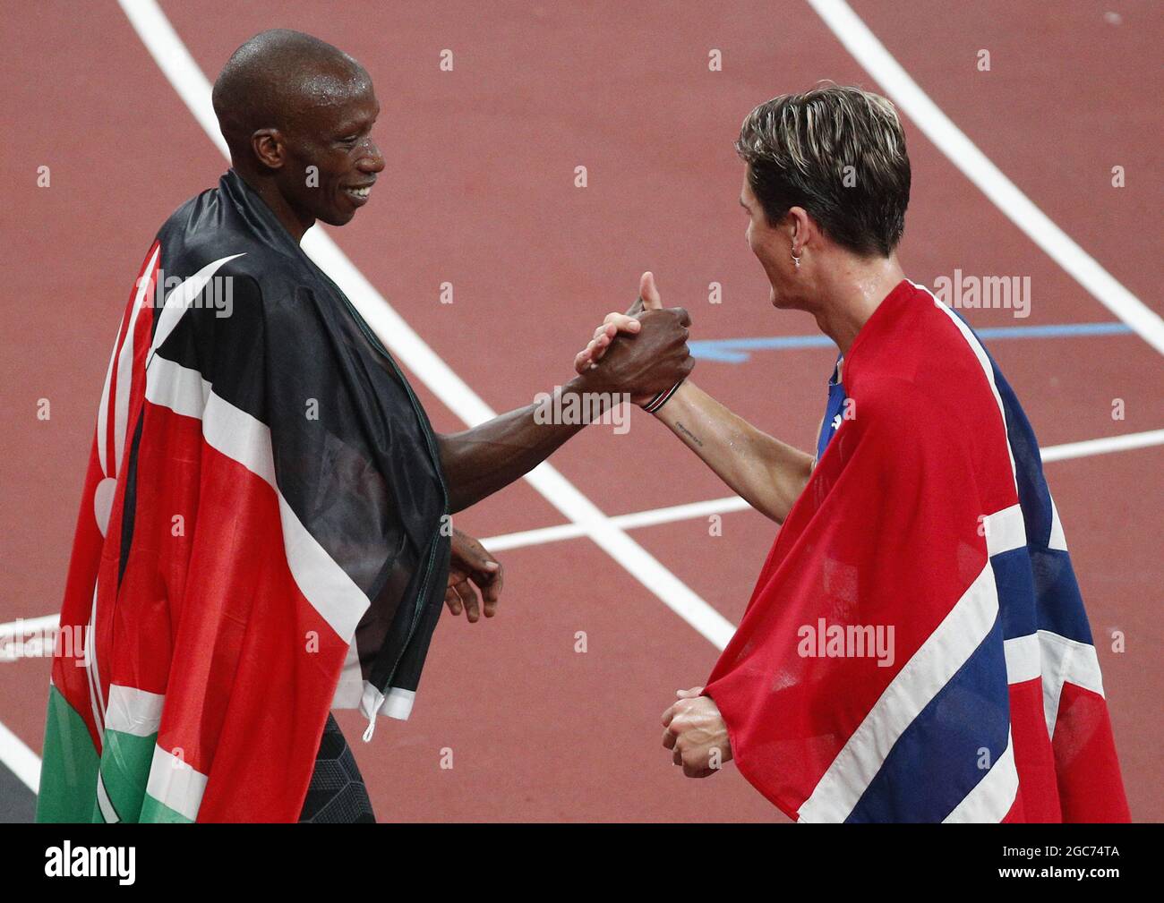 Tokyo, Japan. 07th Aug, 2021. Norway's Jakob Ingebrigtsen (R) wins the Men's 1500m Final in 3:28.32 and congratulates Kenya's Timothy Cheruiyot on finishing second, 3:29.01 at the Olympic Stadium during the 2020 Summer Olympics in Tokyo, Japan on Saturday, August 7, 2021. Photo by Bob Strong/UPI Credit: UPI/Alamy Live News Stock Photo
