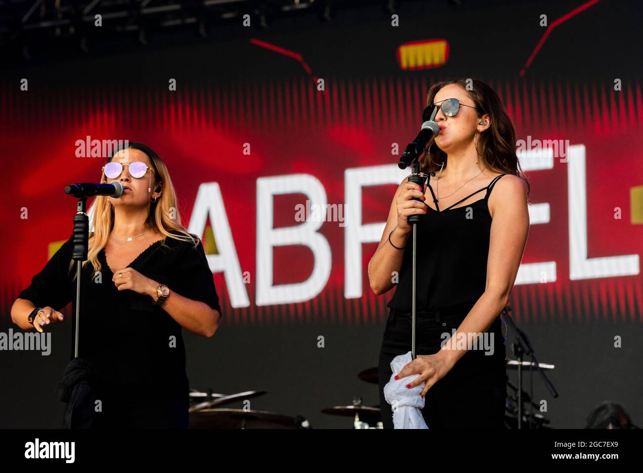 Female backing singers for Gabrielle singer, performing at Fantasia music festival in Maldon, Essex, UK. First concert after COVID 19 pandemic Stock Photo