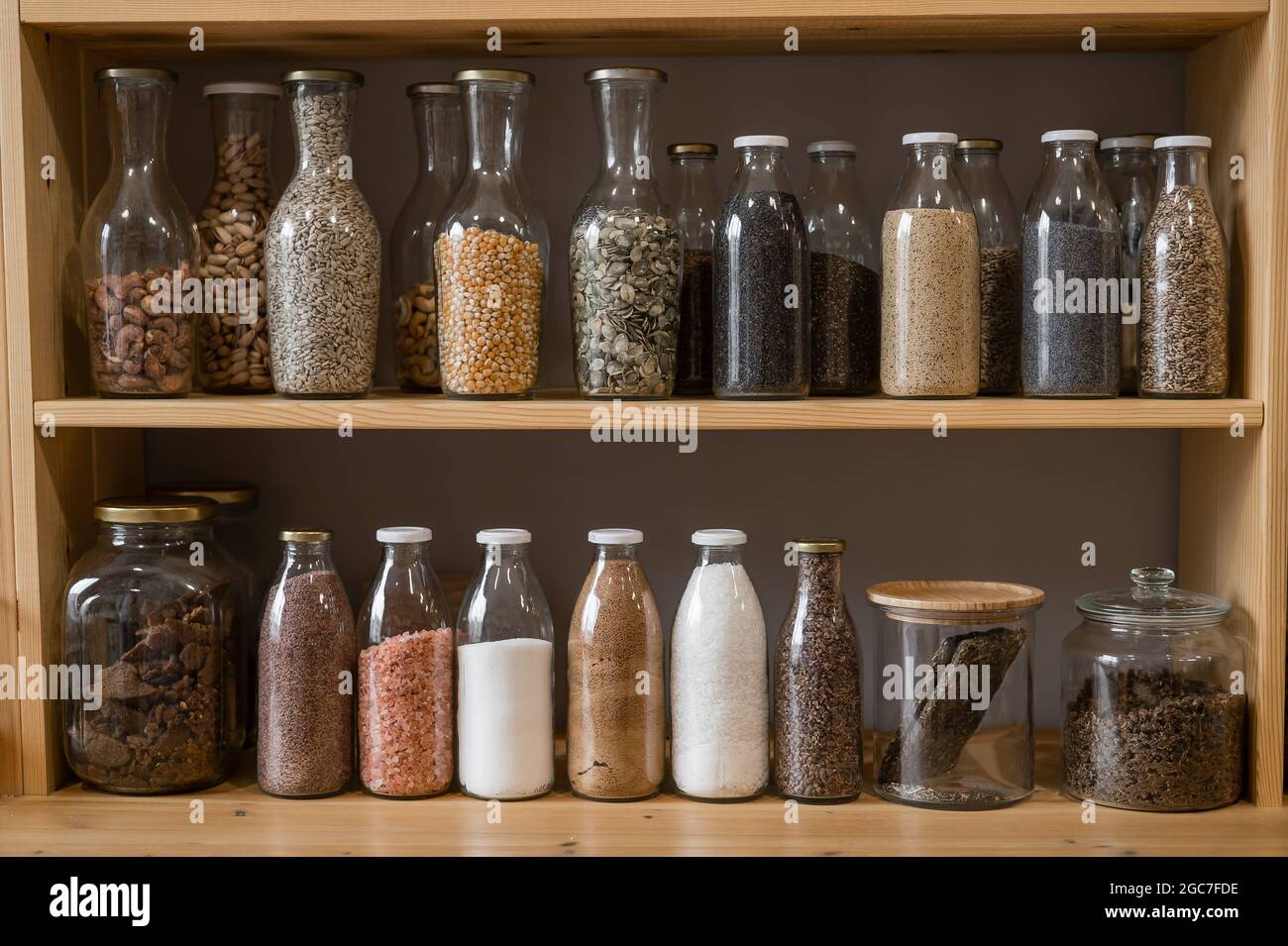 Glass jars with cereals in an eco friendly store. The concept of a