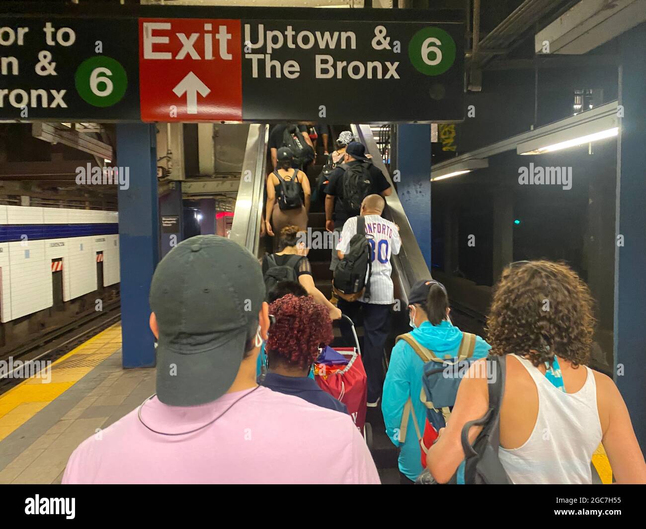 Riders switching to the uptown 6 train to the Bronx in the Bleeker ...