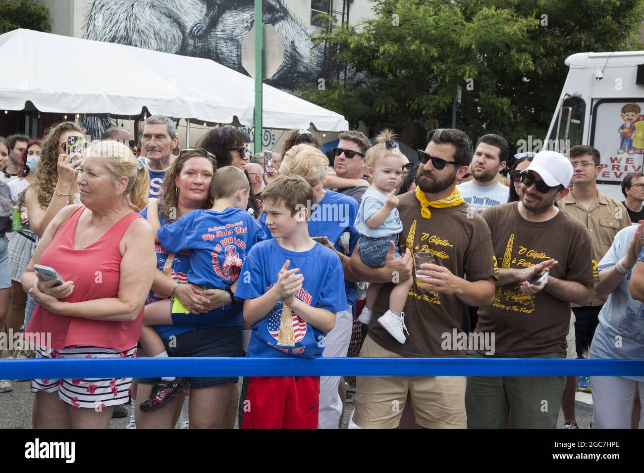People of all ethnicities crowd North 8th Street at the annual Italian Giglio Feast in