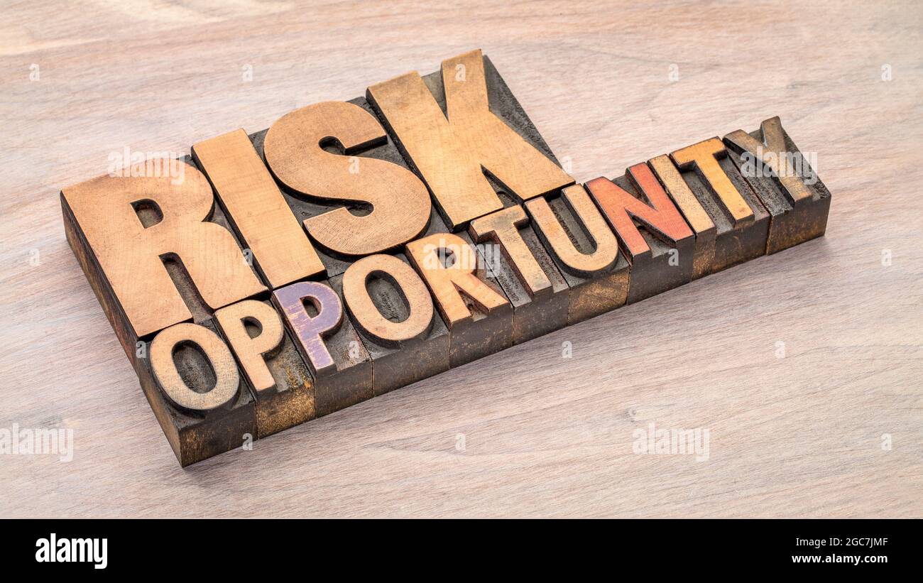 risk and opportunity word abstract in vintage letterpress wood type, business, lifestyle and personal development concept Stock Photo