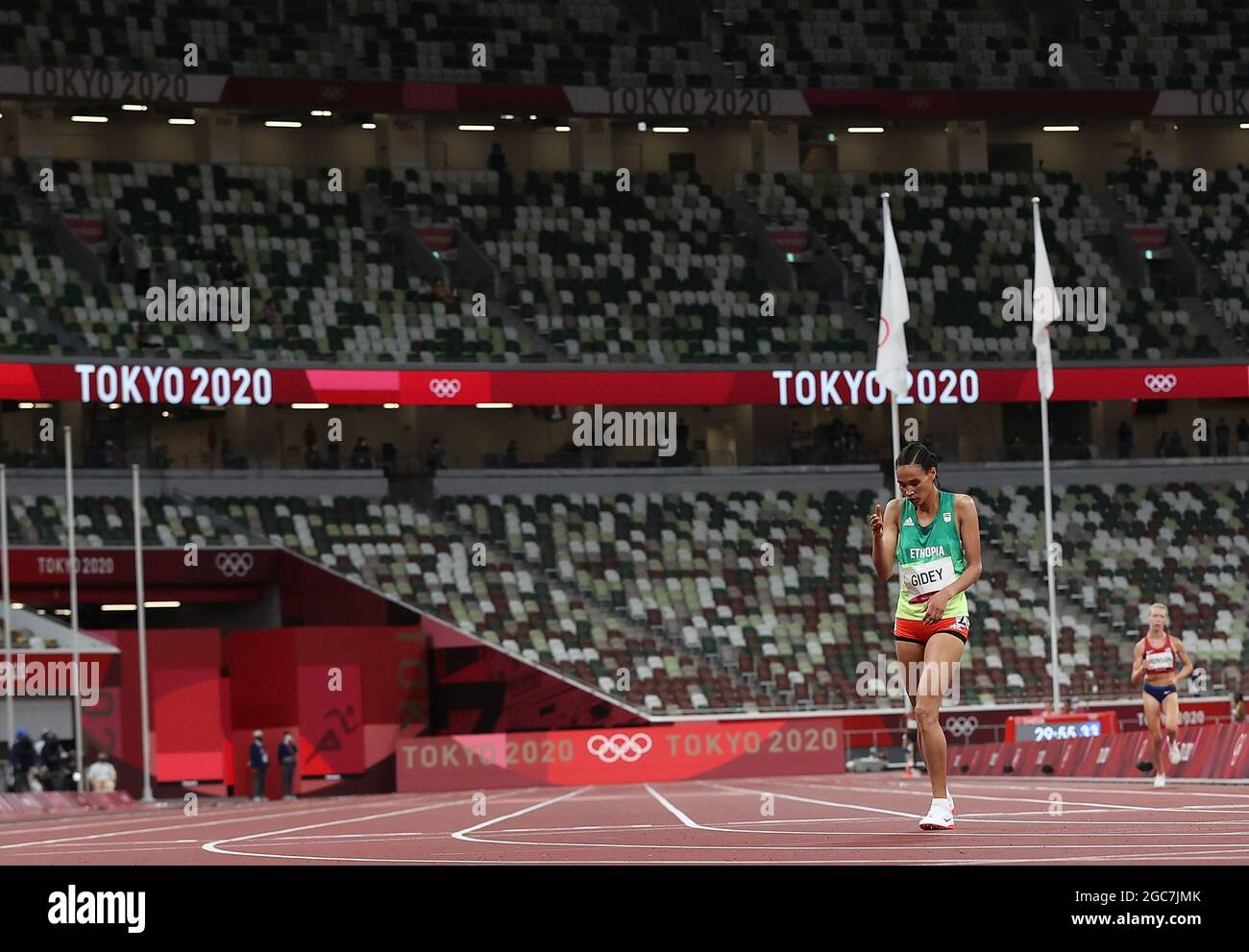 Tokyo, Japan. 7th Aug, 2021. Letesenbet Gidey of Ethiopia reacts after the women's 10000m final at Tokyo 2020 Olympic Games, in Tokyo, Japan, Aug. 7, 2021. Credit: Jia Yuchen/Xinhua/Alamy Live News Stock Photo