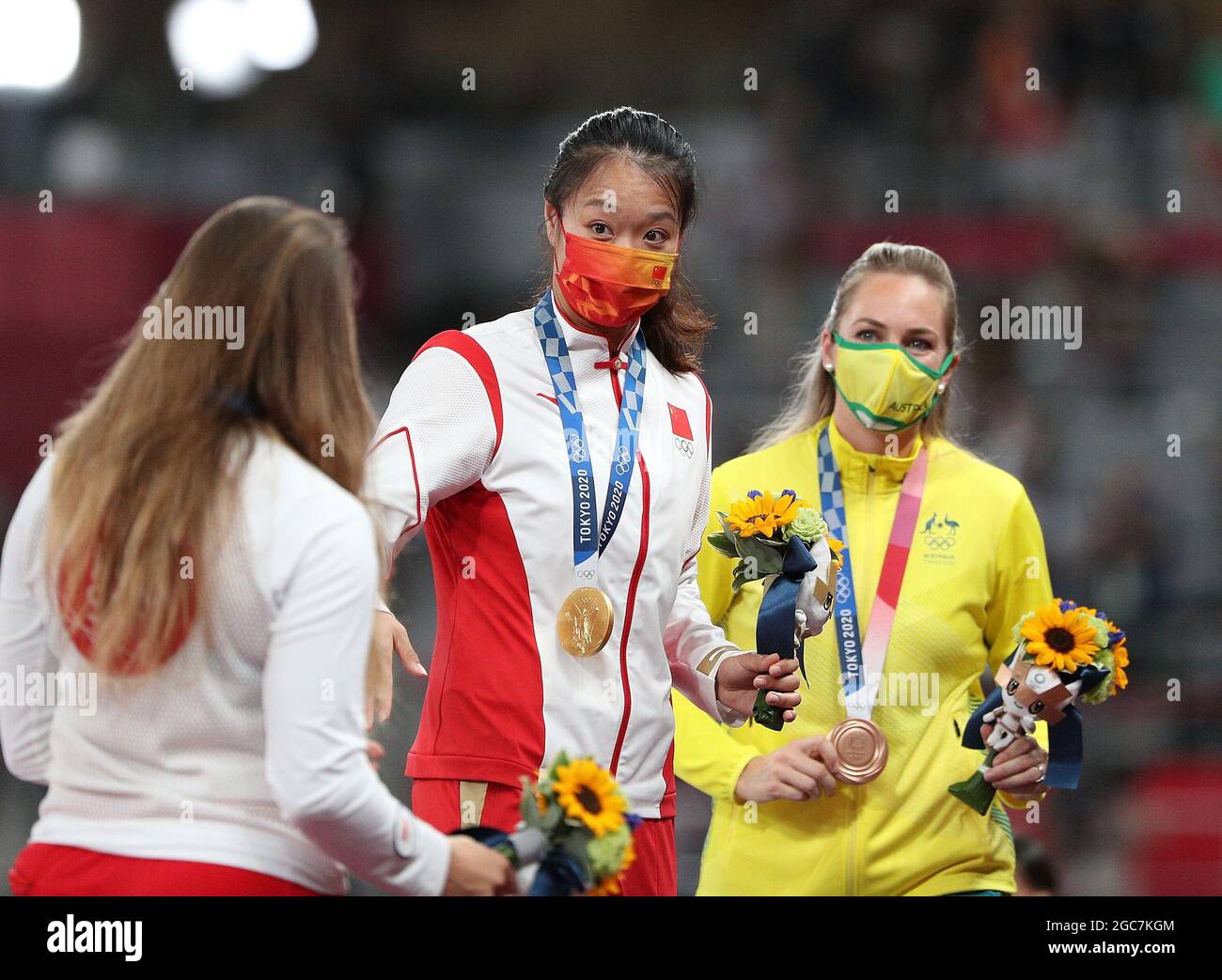 Tokyo, Japan. 7th Aug, 2021. Gold medalist Liu Shiying (C) of China, silver medalist Maria Andrejczyk (L) of Poland and bronze medalist Kelsey-Lee Barber of Australia react during the awarding ceremony of the Women's Javelin Throw at the Tokyo 2020 Olympic Games in Tokyo, Japan, Aug. 7, 2021. Credit: Li Ming/Xinhua/Alamy Live News Stock Photo