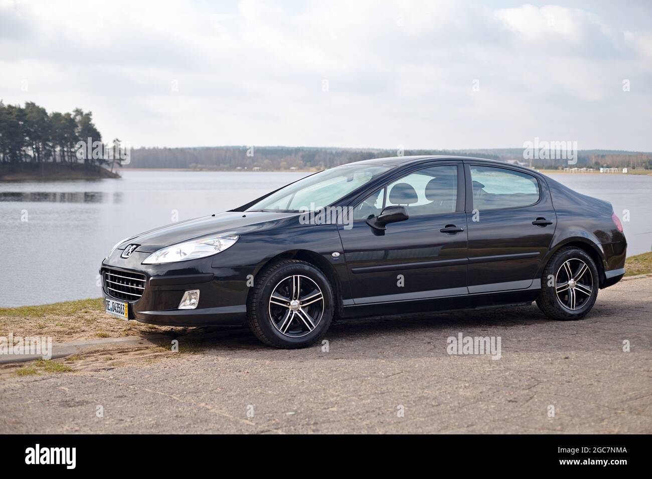 Berlin - April 2014: Peugeot 407 2003-2010 sedan pre facelift three quarter  side view on road outdoors over spring landscape background with lake and  Stock Photo - Alamy