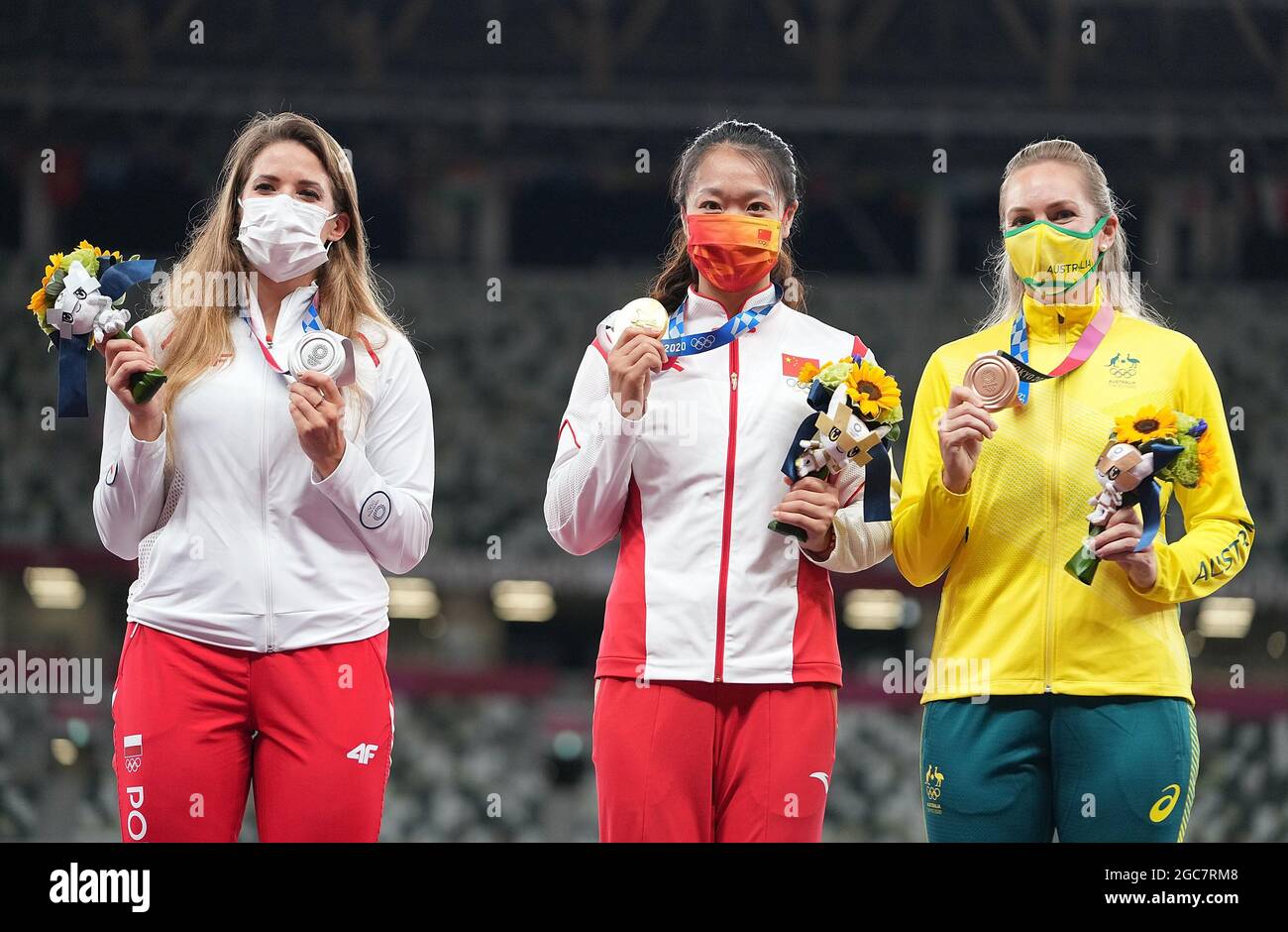 Tokyo, Japan. 7th Aug, 2021. Gold medalist Liu Shiying (C) of China, silver medalist Maria Andrejczyk (L) of Poland and bronze medalist Kelsey-Lee Barber of Australia react during the awarding ceremony of the Women's Javelin Throw at the Tokyo 2020 Olympic Games in Tokyo, Japan, Aug. 7, 2021. Credit: Lui Siu Wai/Xinhua/Alamy Live News Stock Photo