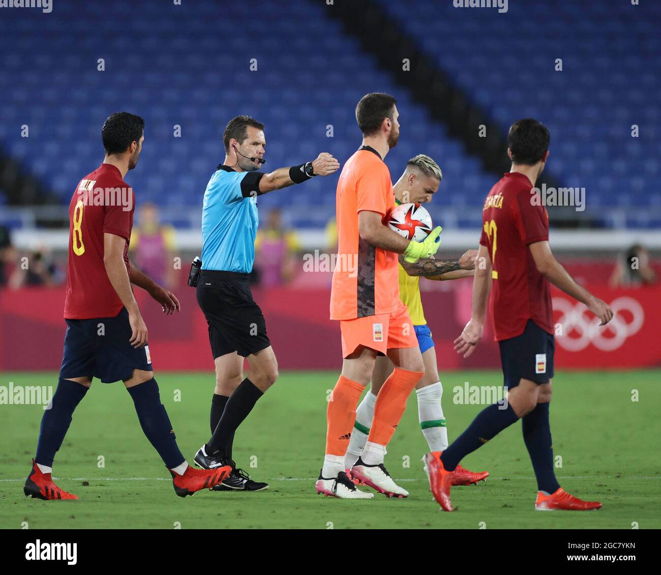 Yokohama, Japan. 7th Aug, 2021. Referee awards Brazil a penaly after viewing the VAR during the men's football final between Brazil and Spain at the Tokyo 2020 Olympic Games in Yokohama, Japan, Aug. 7, 2021. Credit: Cao Can/Xinhua/Alamy Live News Stock Photo