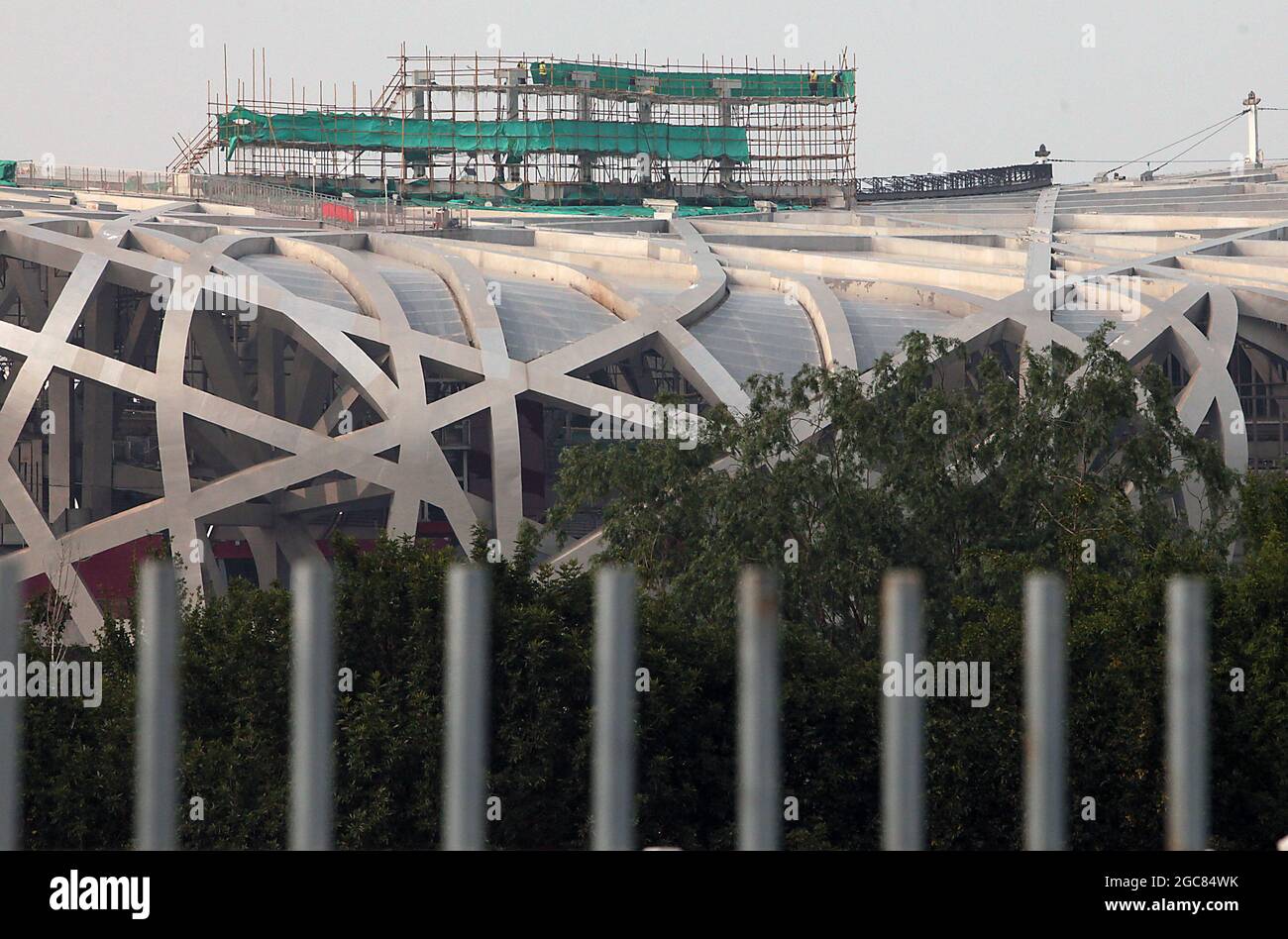 Beijing, China. 07th Aug, 2021. Workers renovate parts of the National Stadium (Bird's Nest) in Beijing, on Saturday, August 7, 2021. Pandemic and boycott fears are mounting six months ahead of the Beijing Winter Olympics in 2022. The Bird's Nest will be used for the closing ceremony. Photo by Stephen Shaver/UPI Credit: UPI/Alamy Live News Stock Photo