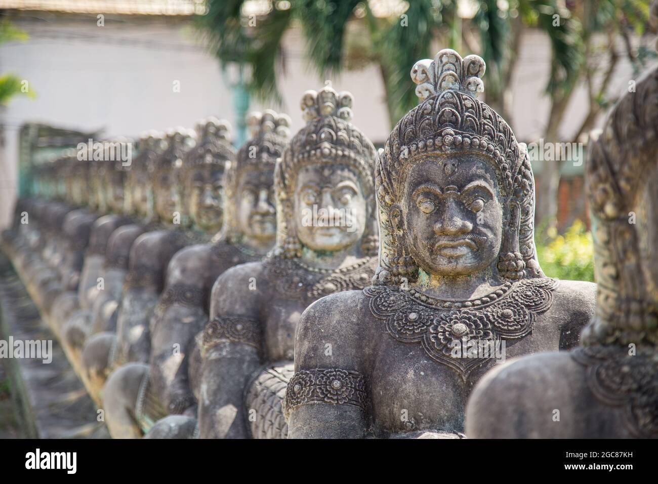 Rows of old statues in Siem Reap Cambodia Stock Photo