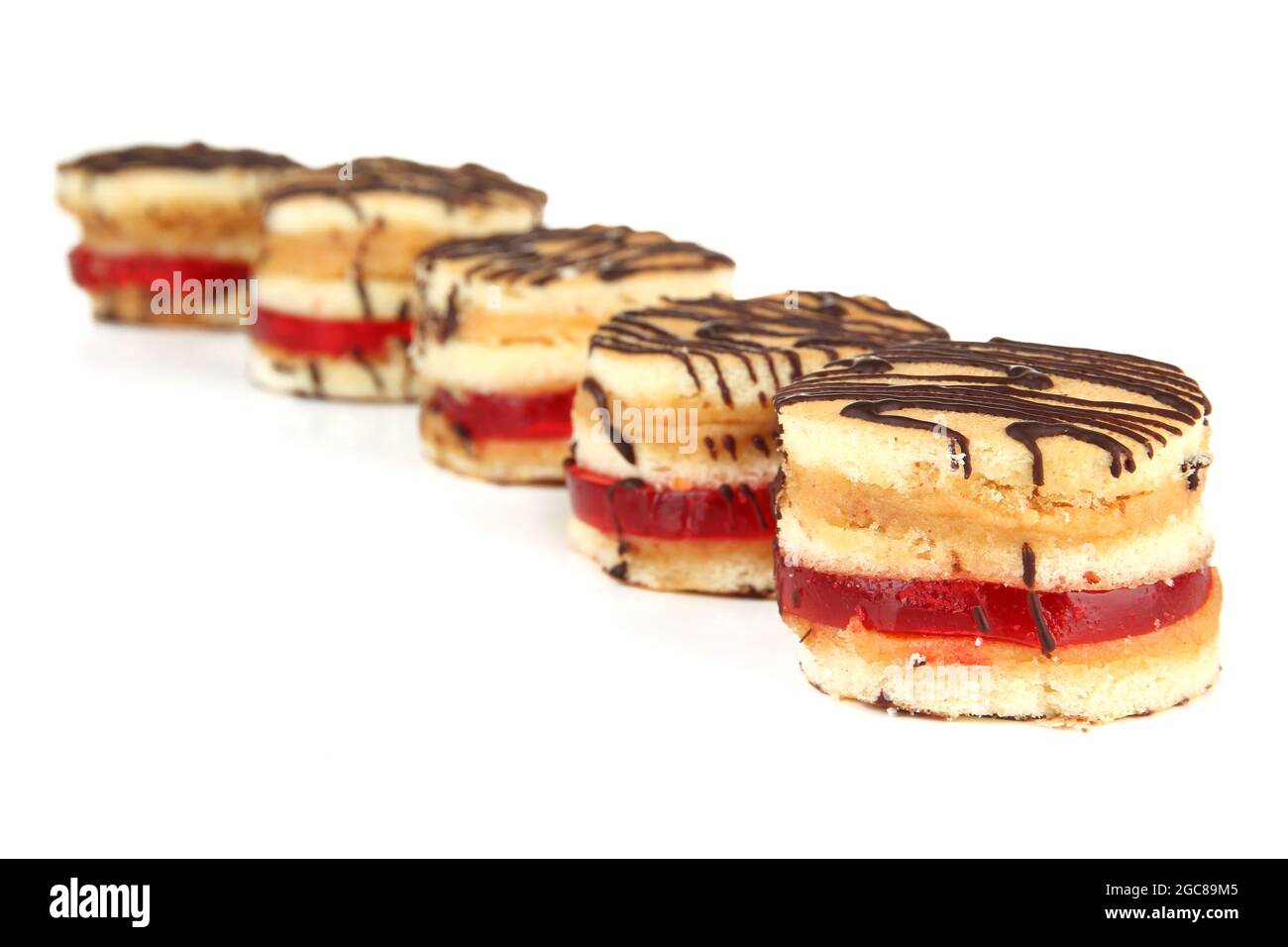 Tasty biscuit cakes, isolated on white Stock Photo - Alamy