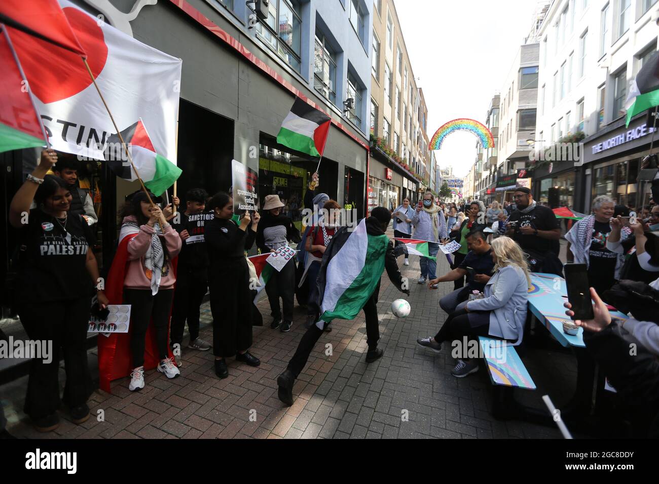 London, England, UK. 7th Aug, 2021. Protesters stage a protest outside Puma  store in Carnaby Street. Boycott, DivestmentÂ andÂ Sanction (BDS)Â against  Israel campaign activists walked through central London staging actions  outside