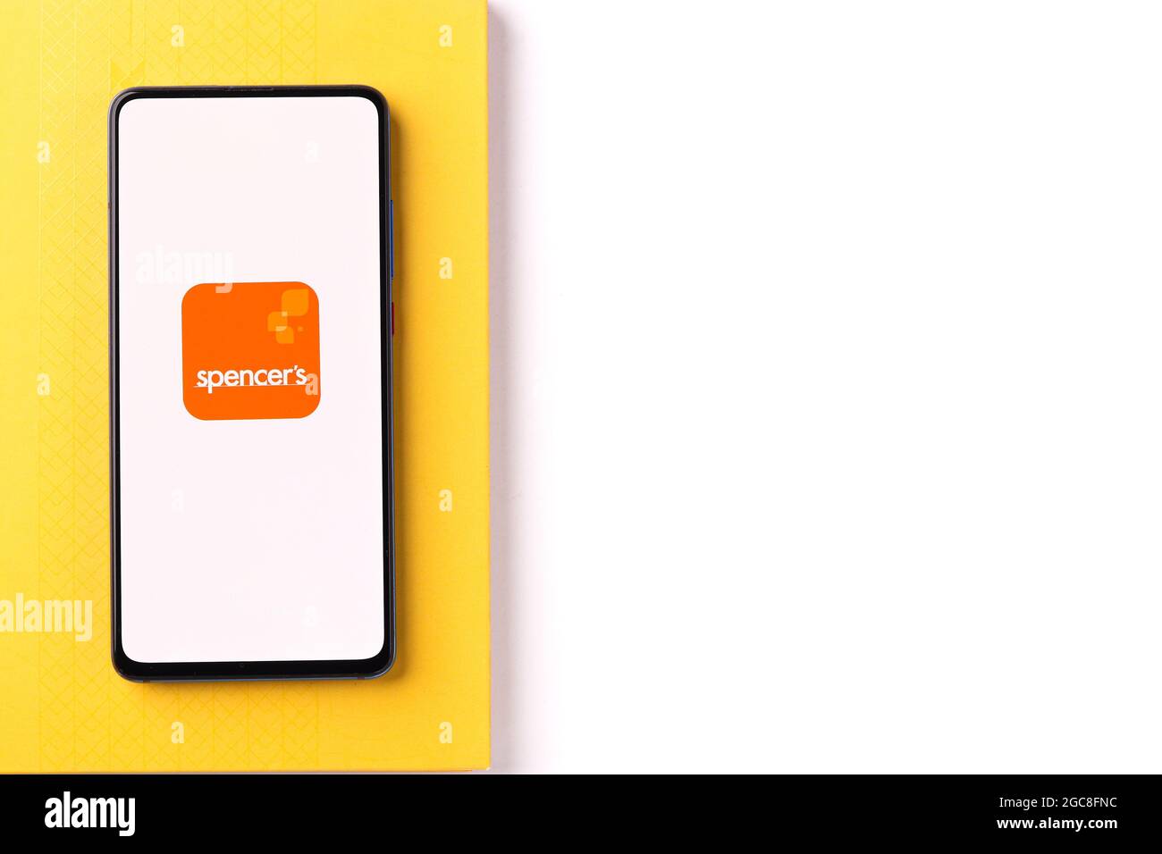 Assam, India - August 6, 2021 : Spencer's Retail logo on phone screen stock image. Stock Photo