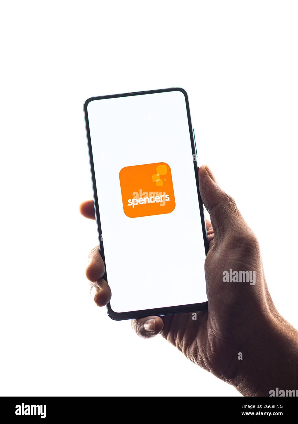 Assam, India - August 6, 2021 : Spencer's Retail logo on phone screen stock image. Stock Photo