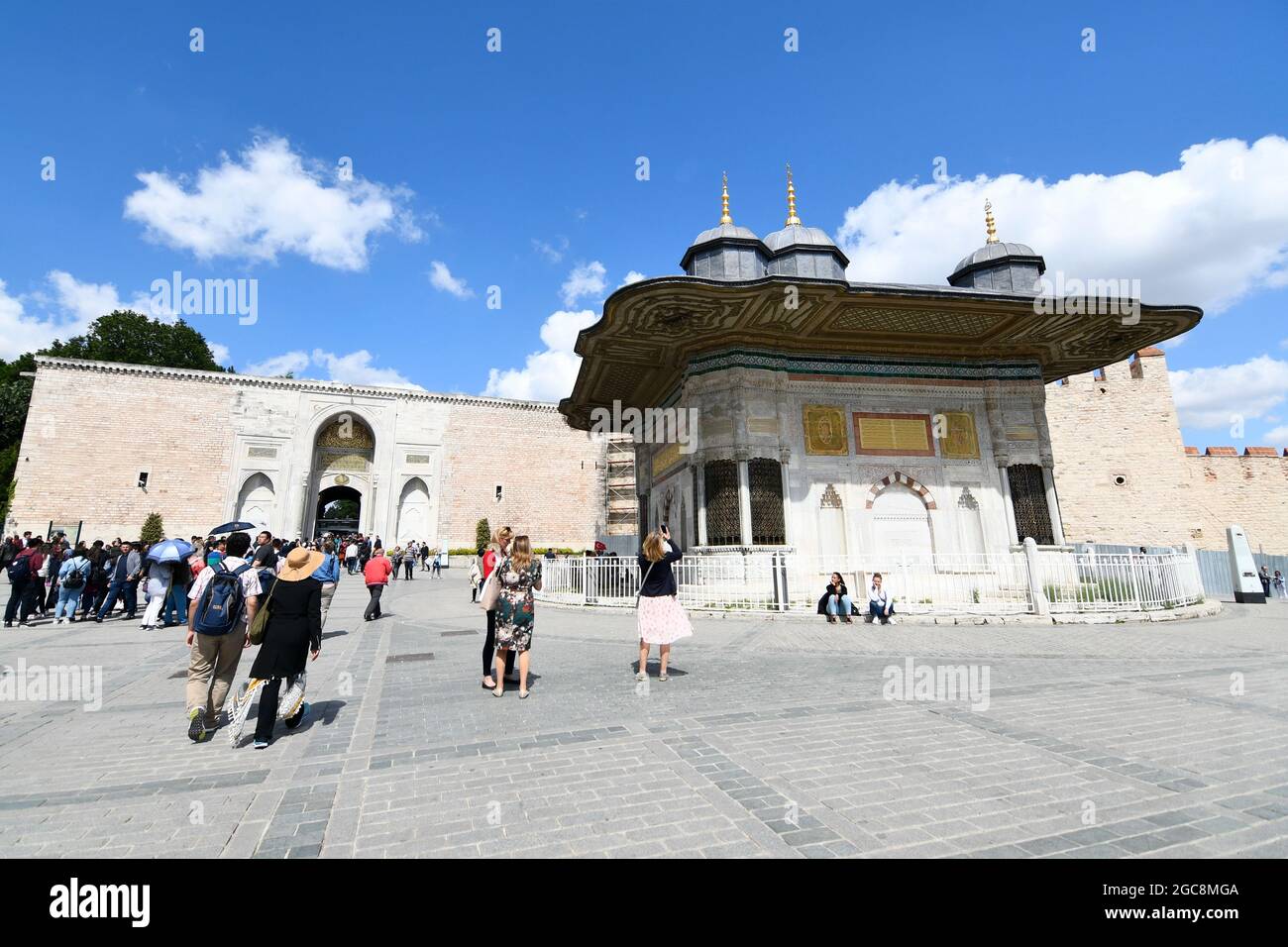 Istanbul, Turkey. Main entrance to Topkapi Palace with the Sultan Ahmet Fountain in the foreground Stock Photo