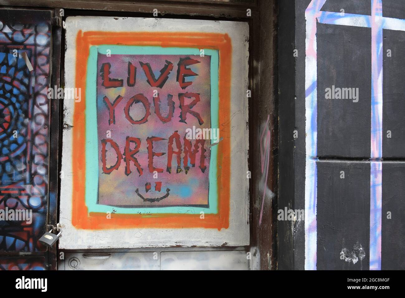 Istanbul, Turkey. 'Love your dreams' written on an old door in Galatasaray Stock Photo