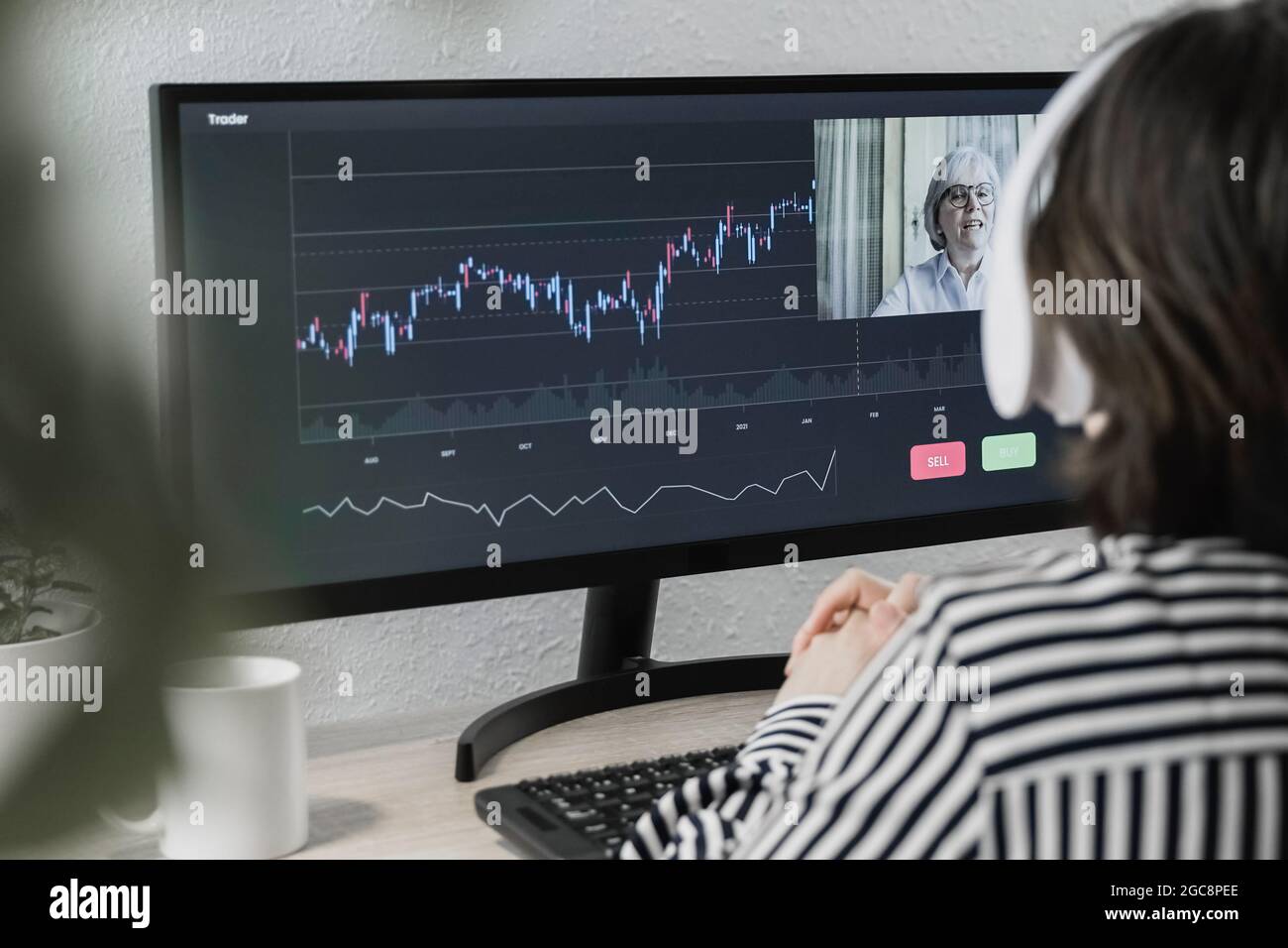 Young woman doing online cryptocurrency online video call class with senior  advisor for blockchain and trading research - defi, exchange and trend tec  Stock Photo - Alamy