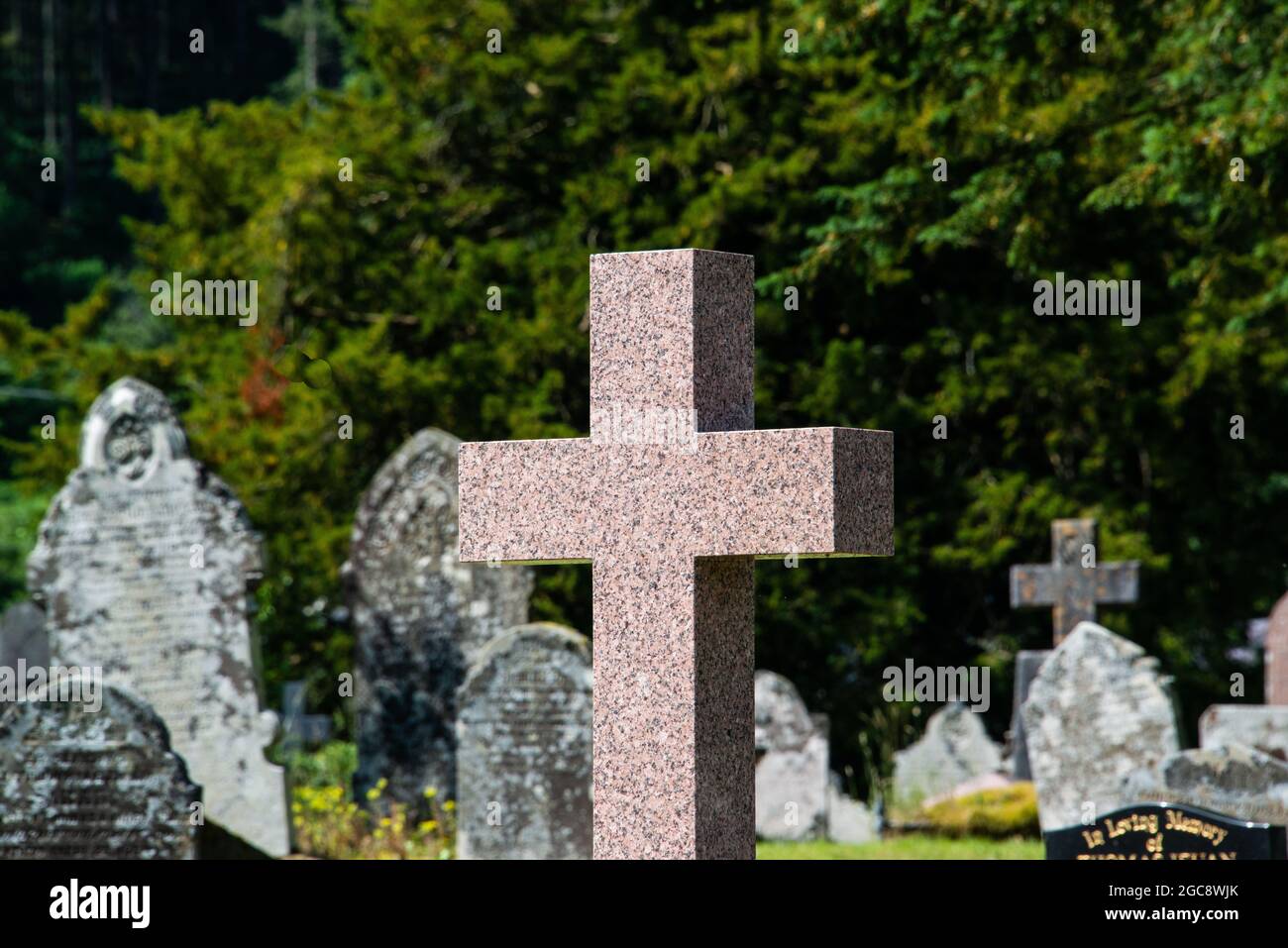 A Christian cross headstone Stock Photo - Alamy