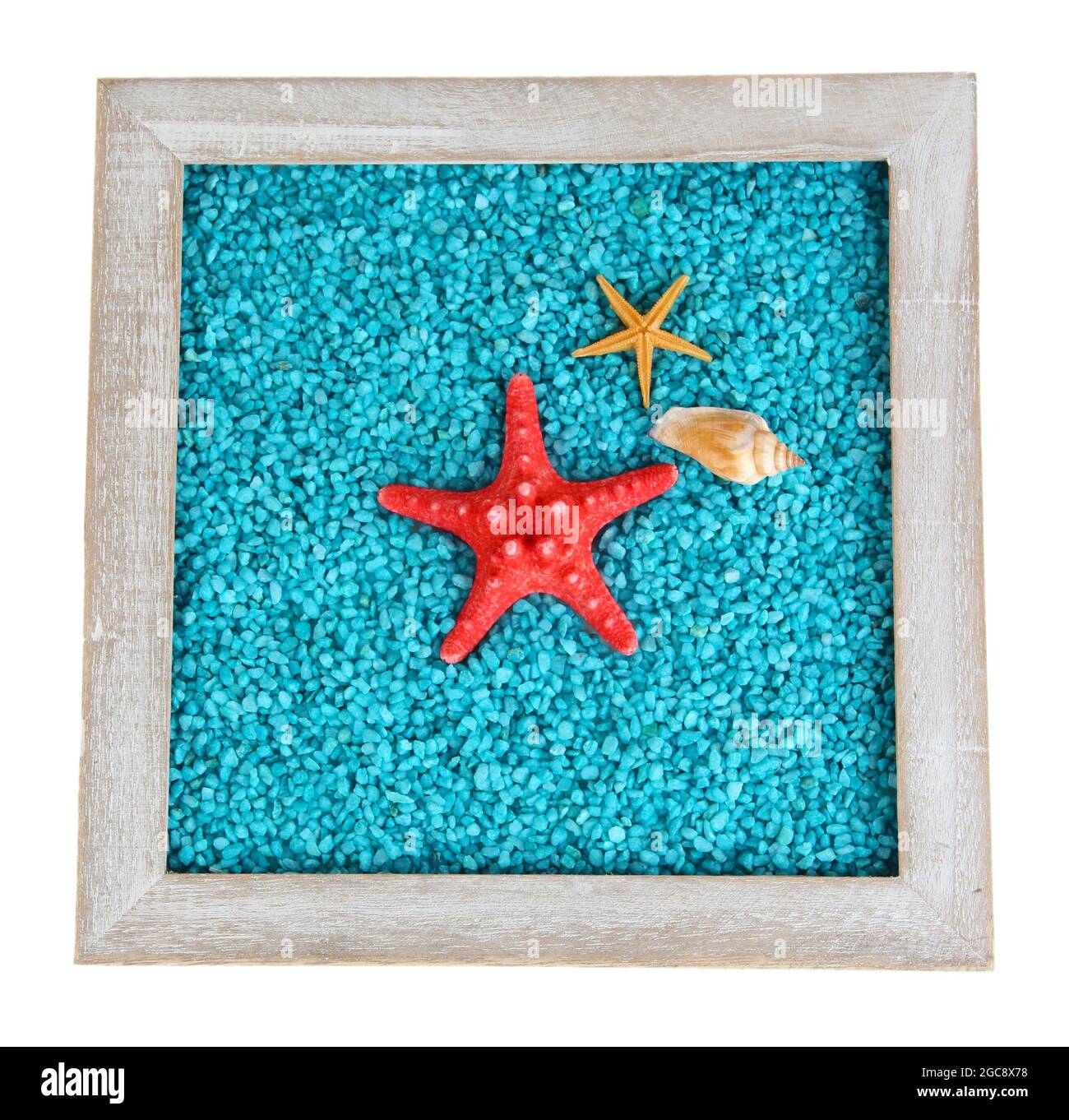 Decorative colored sand with shells isolated on white Stock Photo Alamy