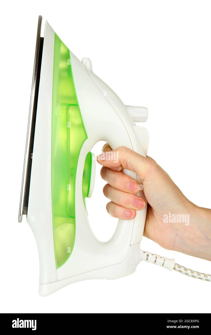 Steam iron in hand, isolated on white Stock Photo Alamy