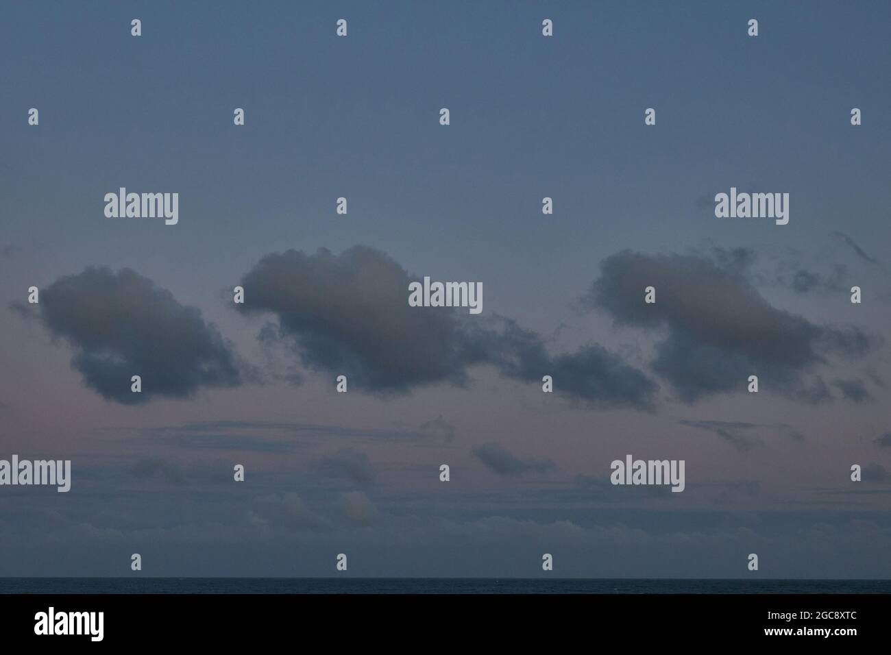 Cloud formations seen on a windy day in summer 2021. Stock Photo
