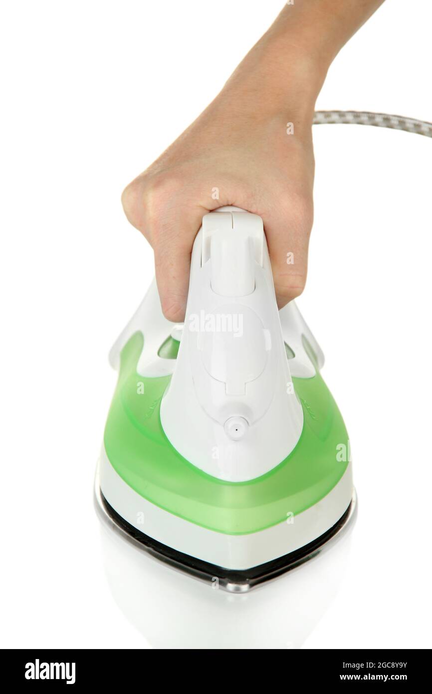Steam iron in hand, isolated on white Stock Photo Alamy