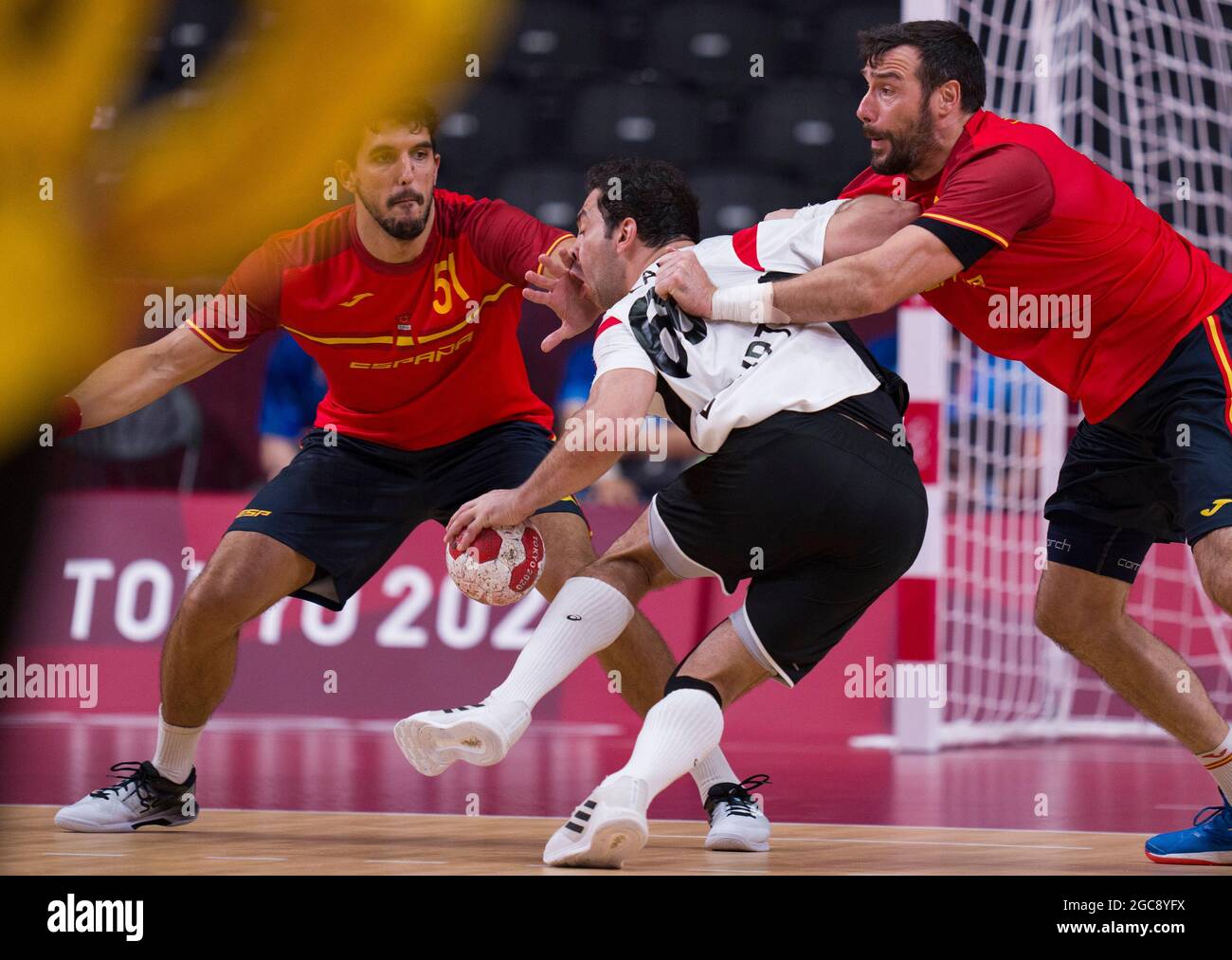 Tokyo, Japan. 7th Aug, 2021. Egypt's Ahmed Mohamed (C) is blocked during  the men's handball bronze medal match between Spain and Egypt at the Tokyo  2020 Olympic Games in Tokyo, Japan, Aug.