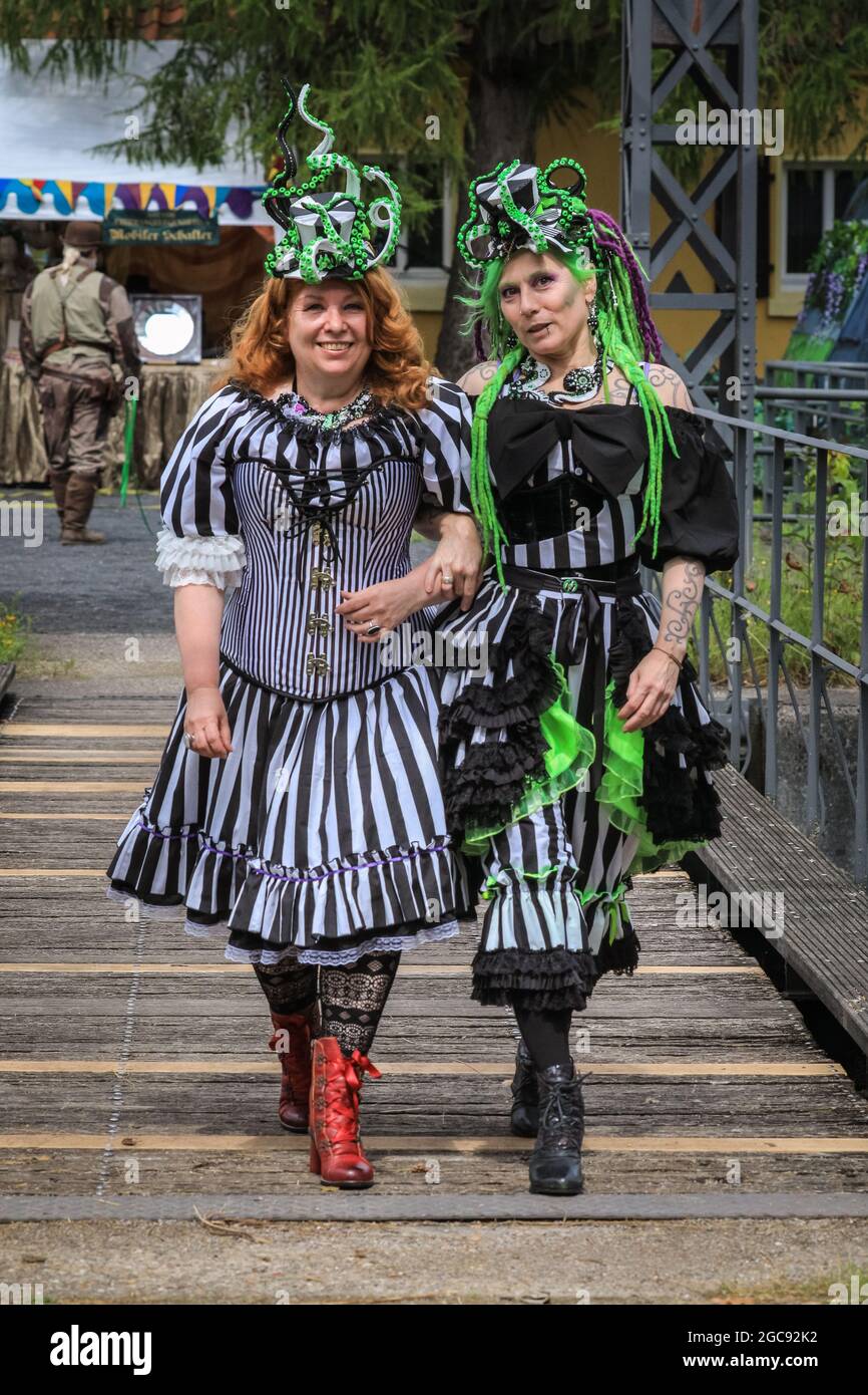 Schiffshebewerk Henrichenburg Waltrop Germany 7th Aug 2021 Two Participants From The Lady Frankenstein Stall Pose In Their Colourful Outfits Steampunk Fans And Visitors Many In Full Retro Futuristic Costumes And Outfits Come Together