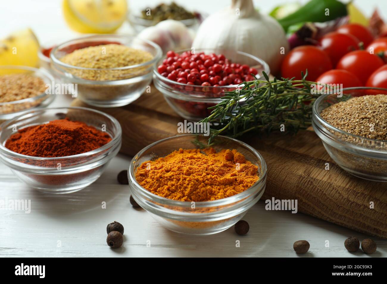Concept of aromatic spices on white wooden table Stock Photo - Alamy