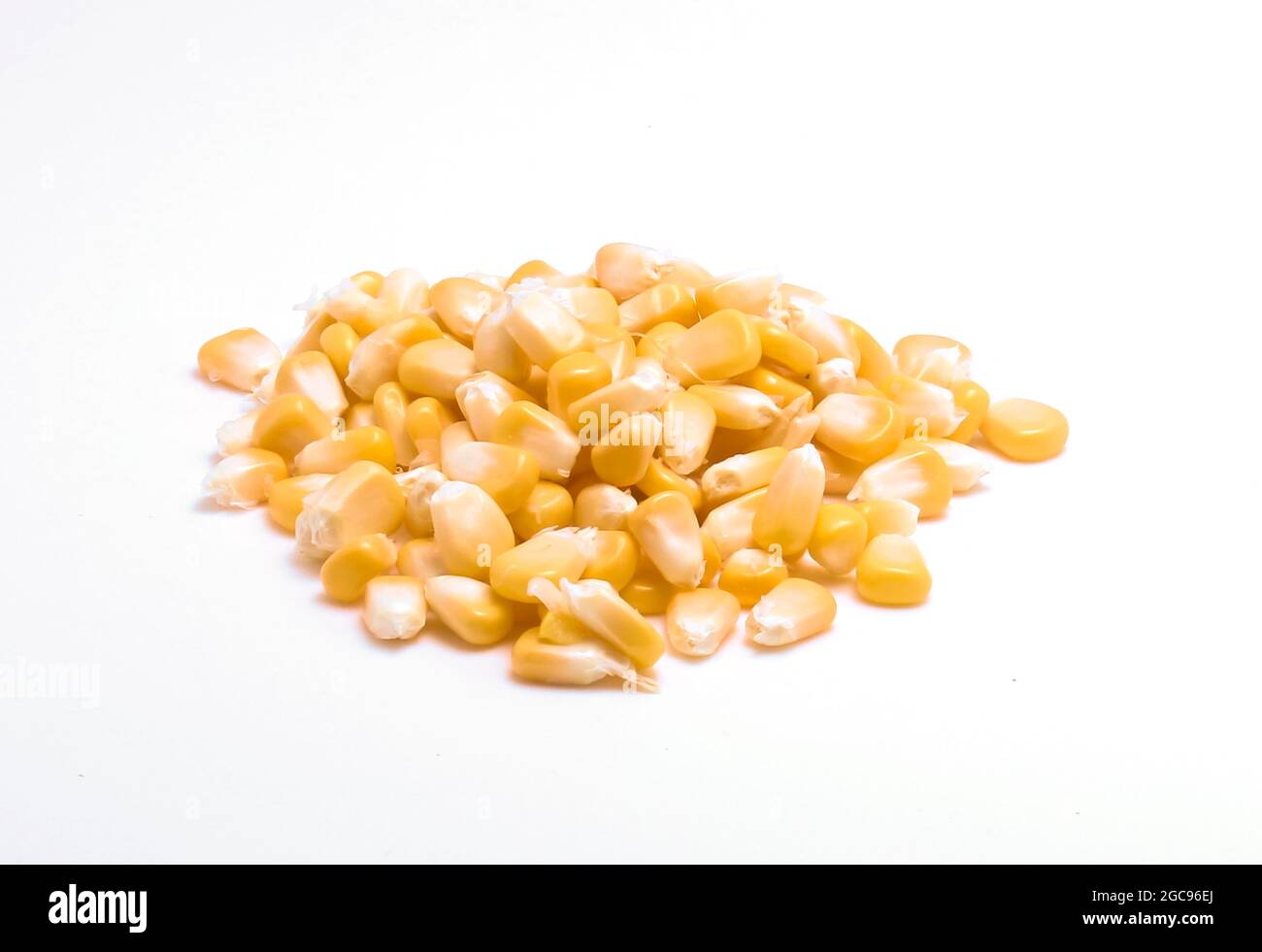 Yellow grain corn isolated on white background, for popcorn Stock Photo
