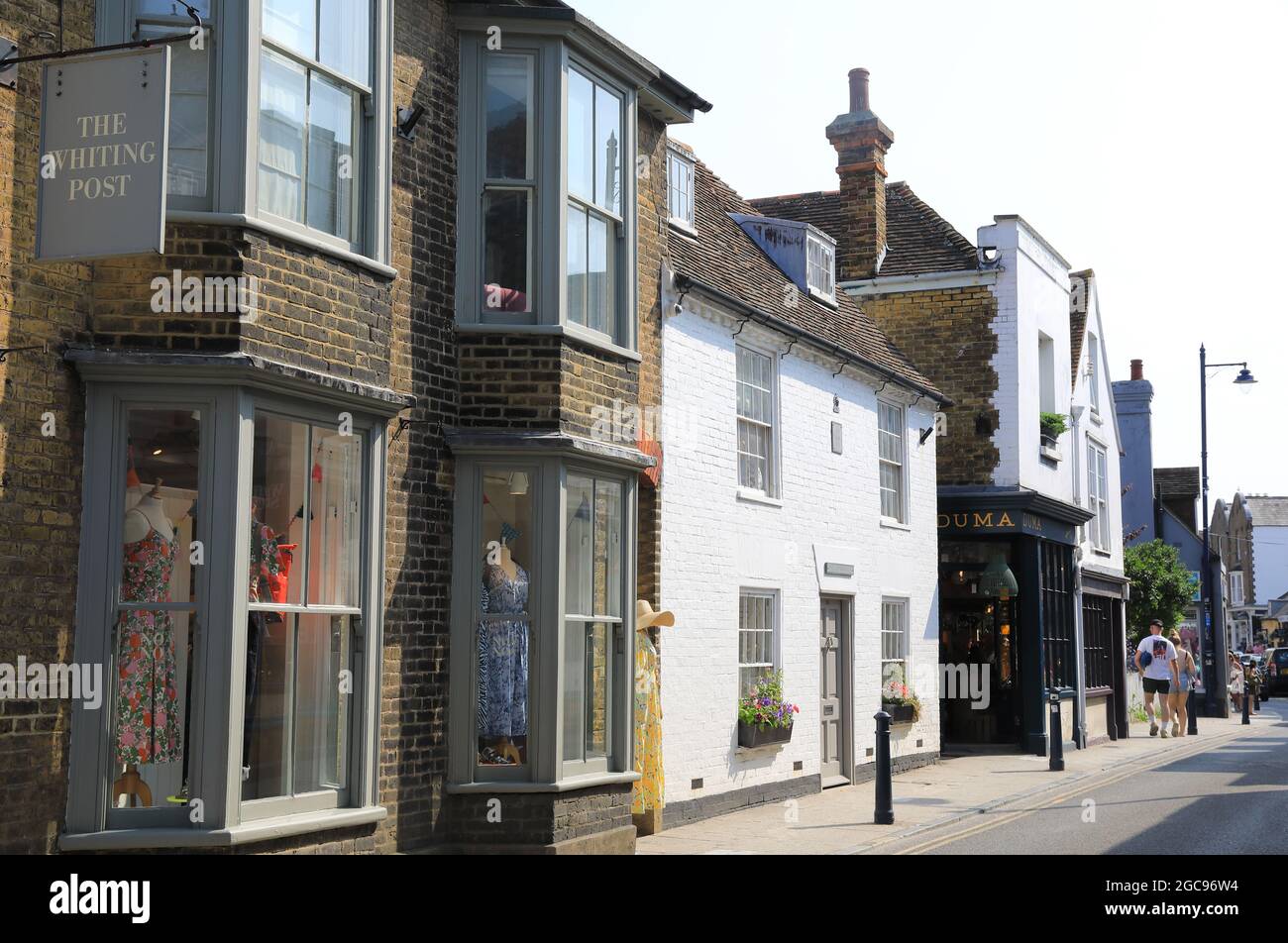 Independent shops and houses on pretty Harbour Street, in coastal
