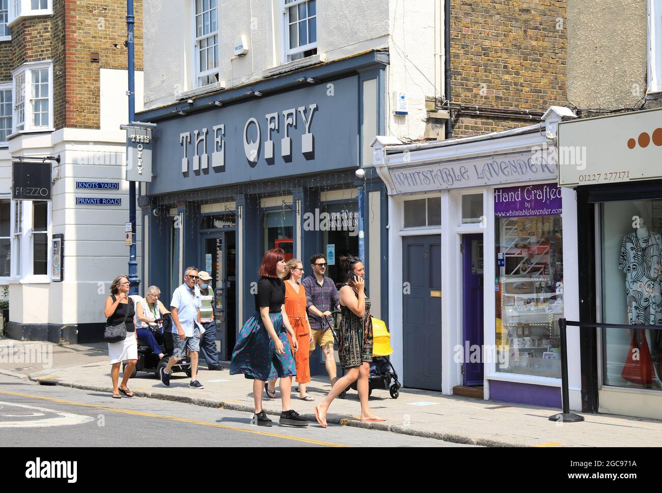 Shops on pretty Harbour Street, in coastal Whitstable, in north Kent