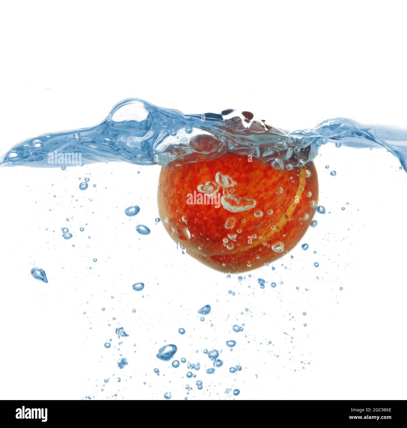 Juicy fruit under water, isolated on white Stock Photo Alamy